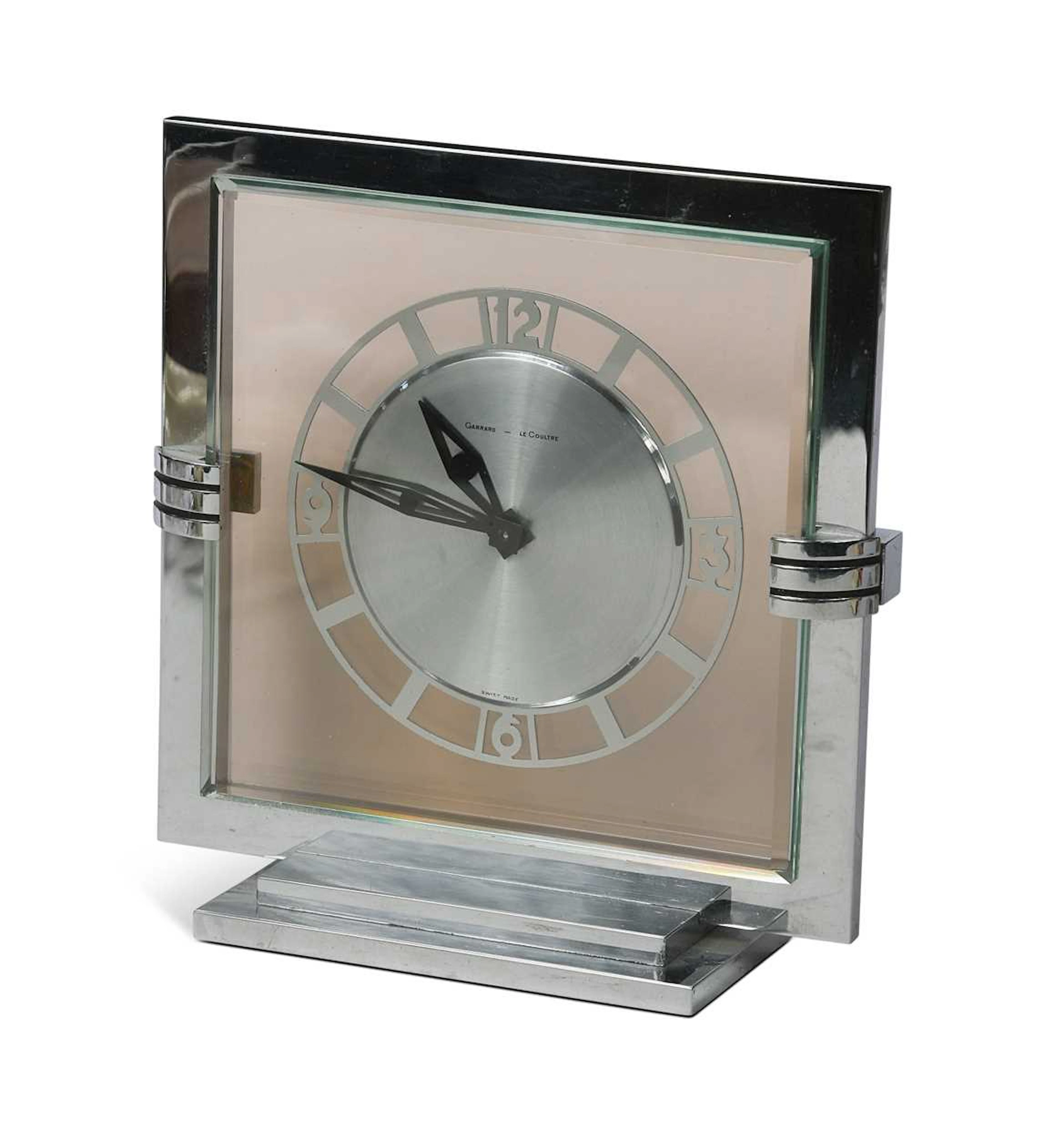An Art Deco Garrard Le Coultre chrome and glass mantle clock