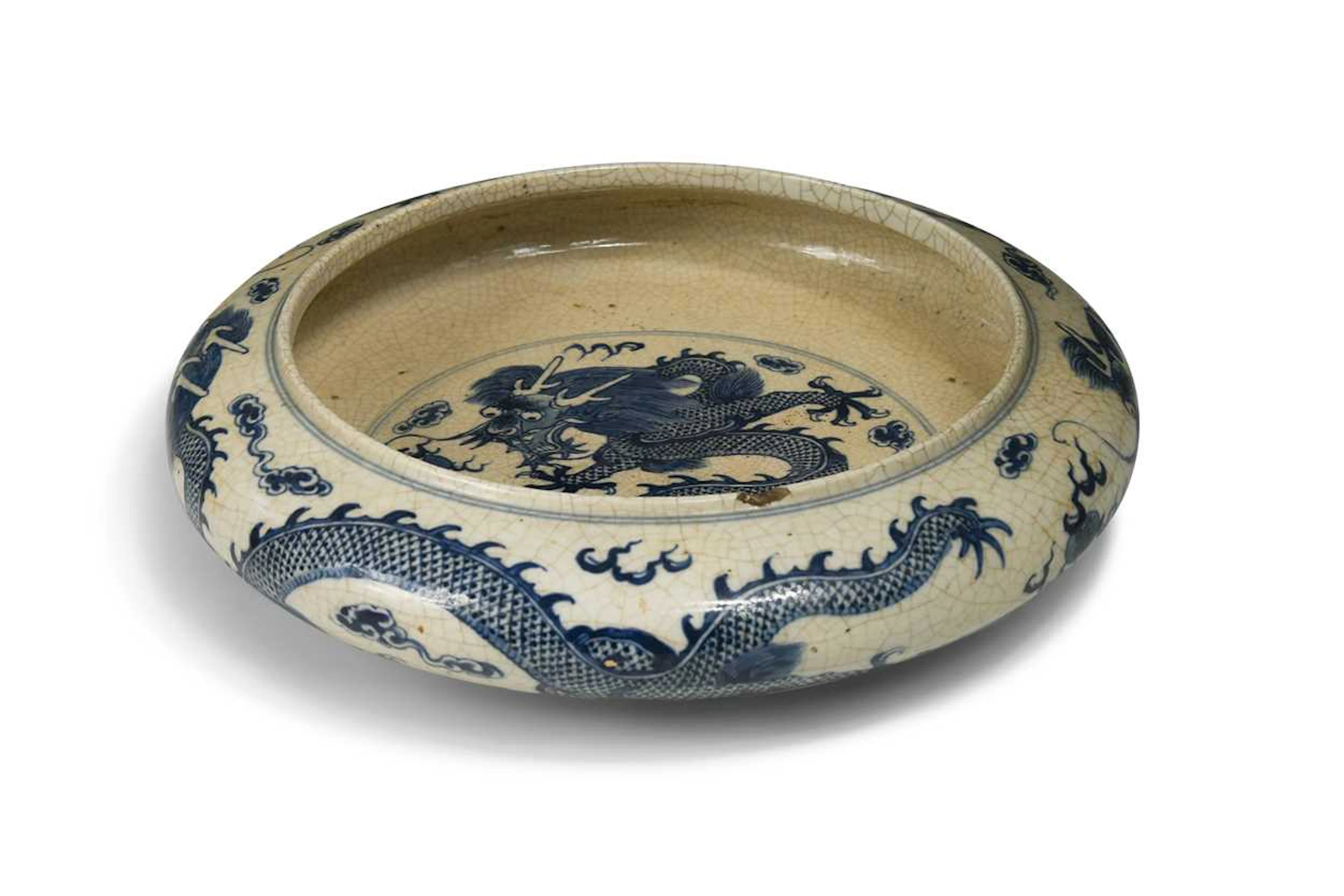 A Chinese soft paste porcelain dragon bowl, late Qing Dynasty