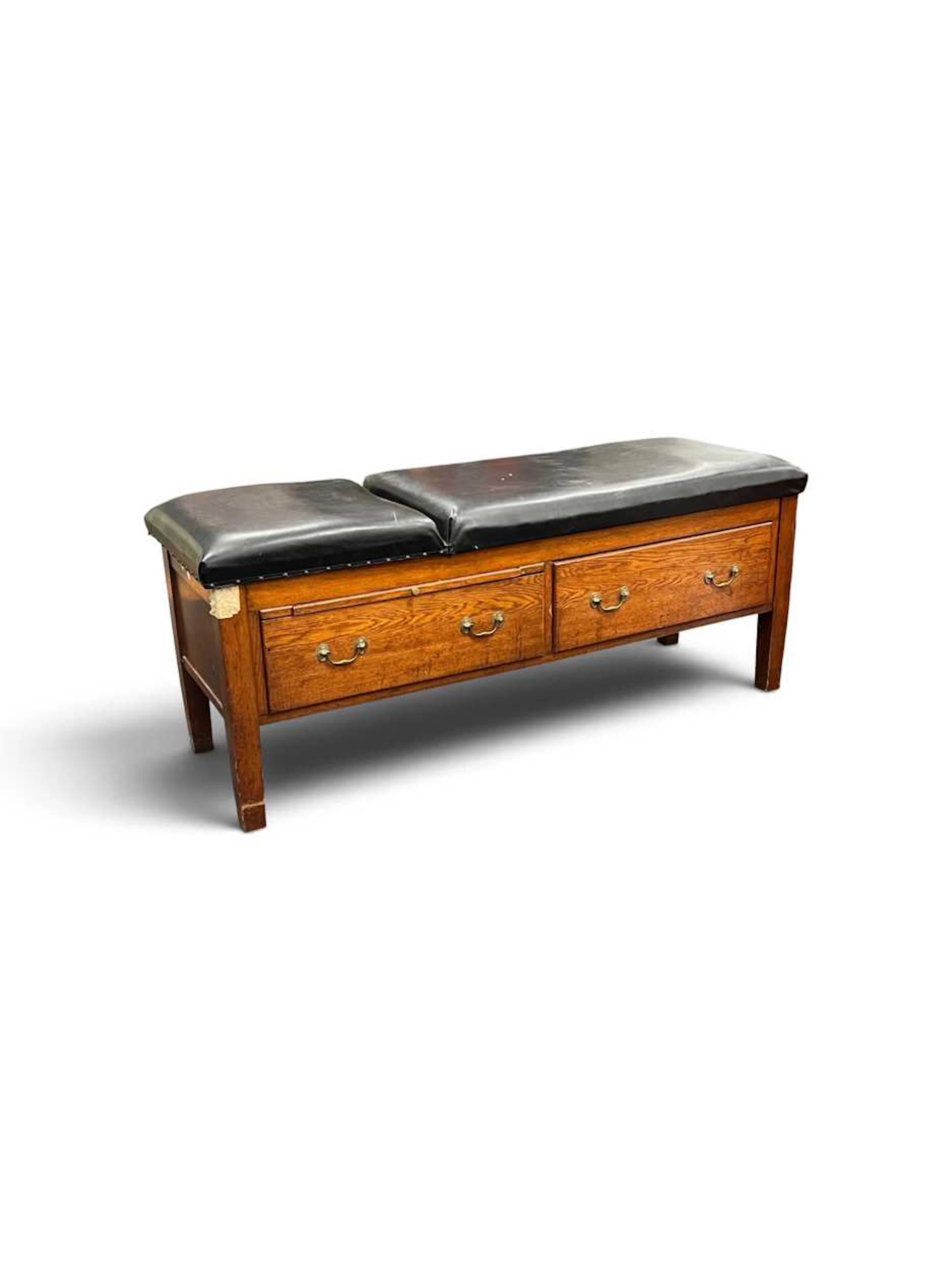 An oak Doctors couch by Philip Harris & Co Ltd Birmingham