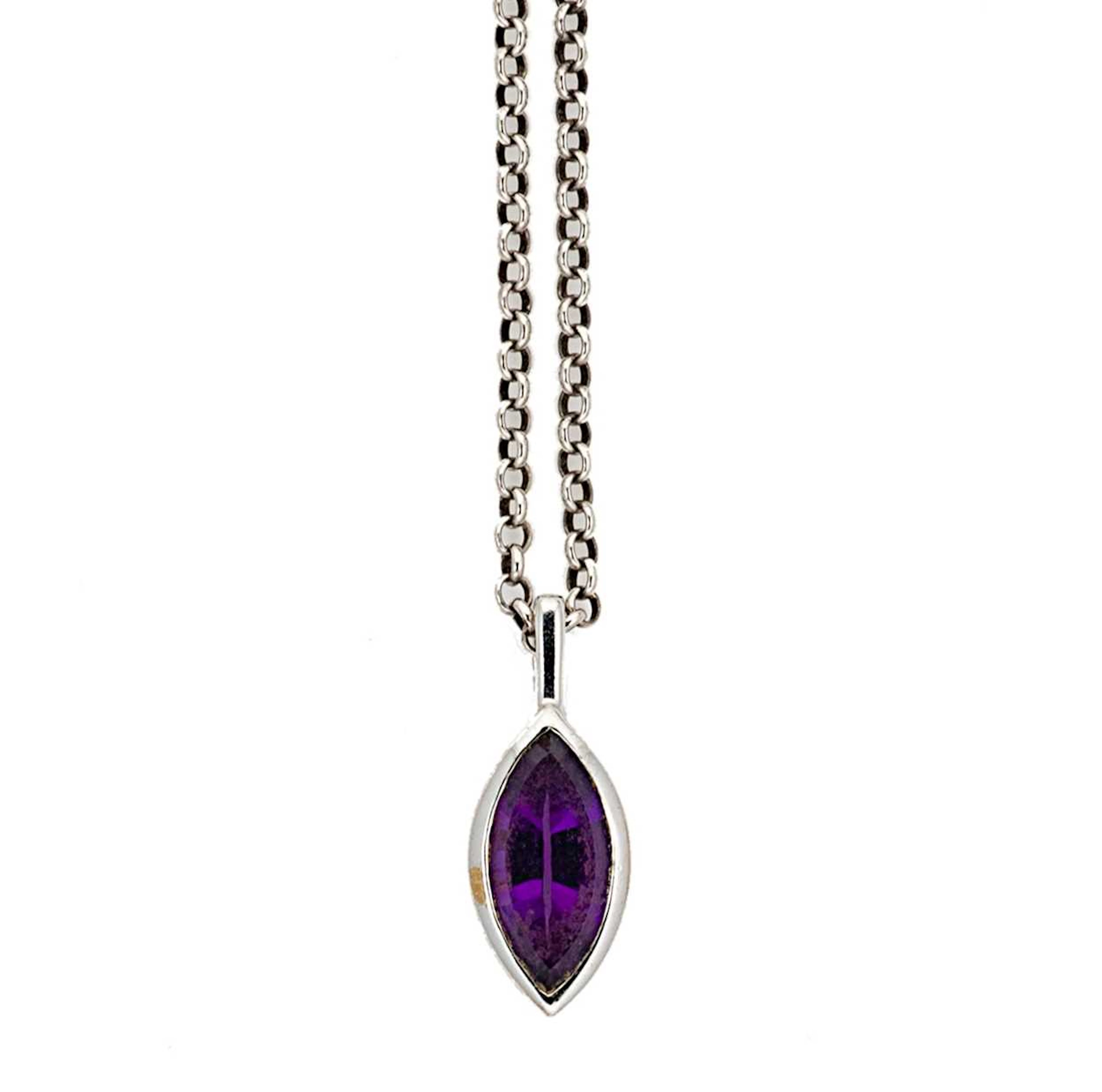 A modern 9ct white gold amethyst pendant on a silver chain weight 3.1g