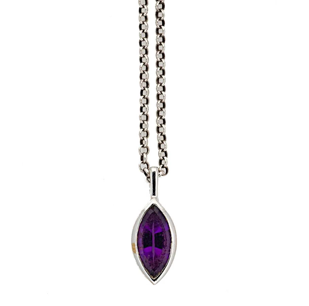 A modern 9ct white gold amethyst pendant on a silver chain weight 3.1g