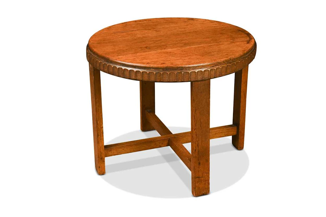 In the manner of Heals, a Modernist pale oak occasional table, circa 1930