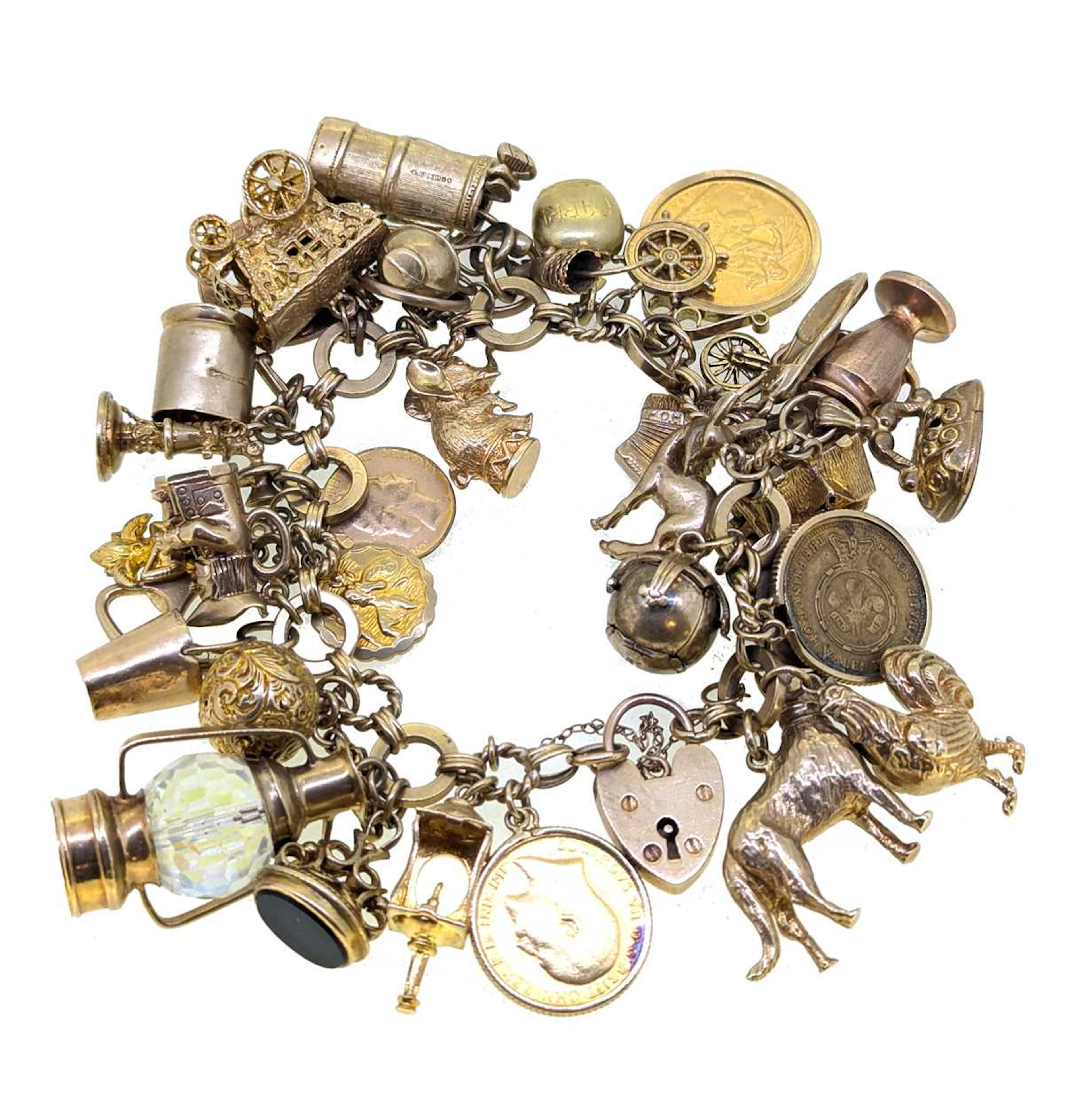 A late 20th century 9ct gold charm bracelet