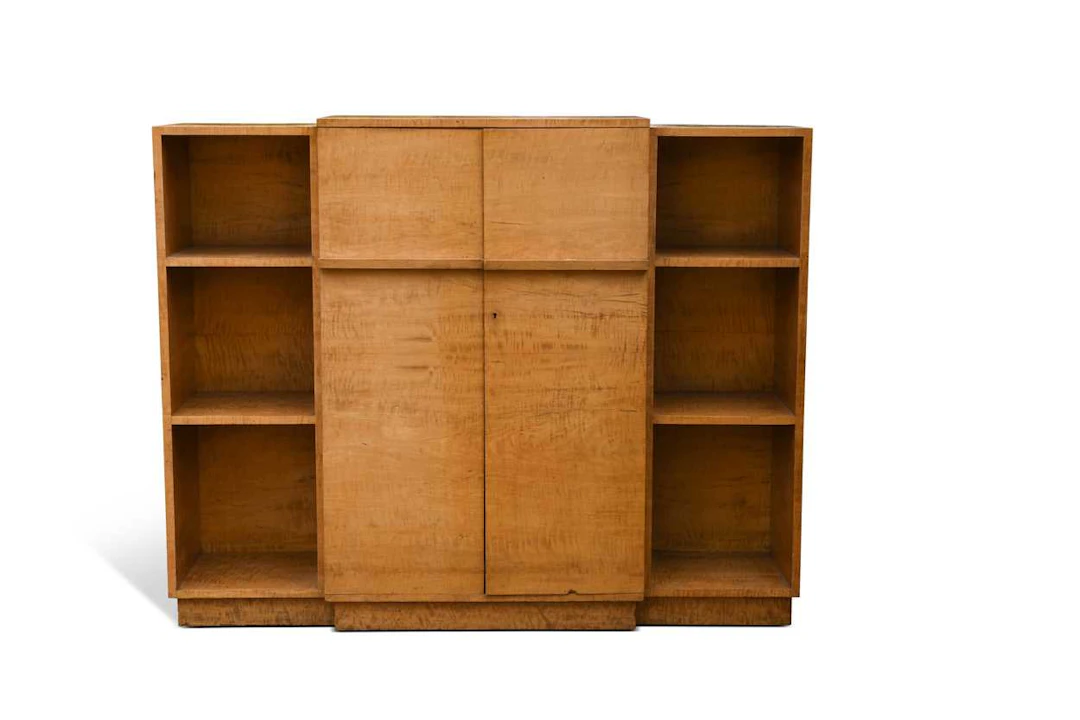 An Art Deco maple breakfront bookcase