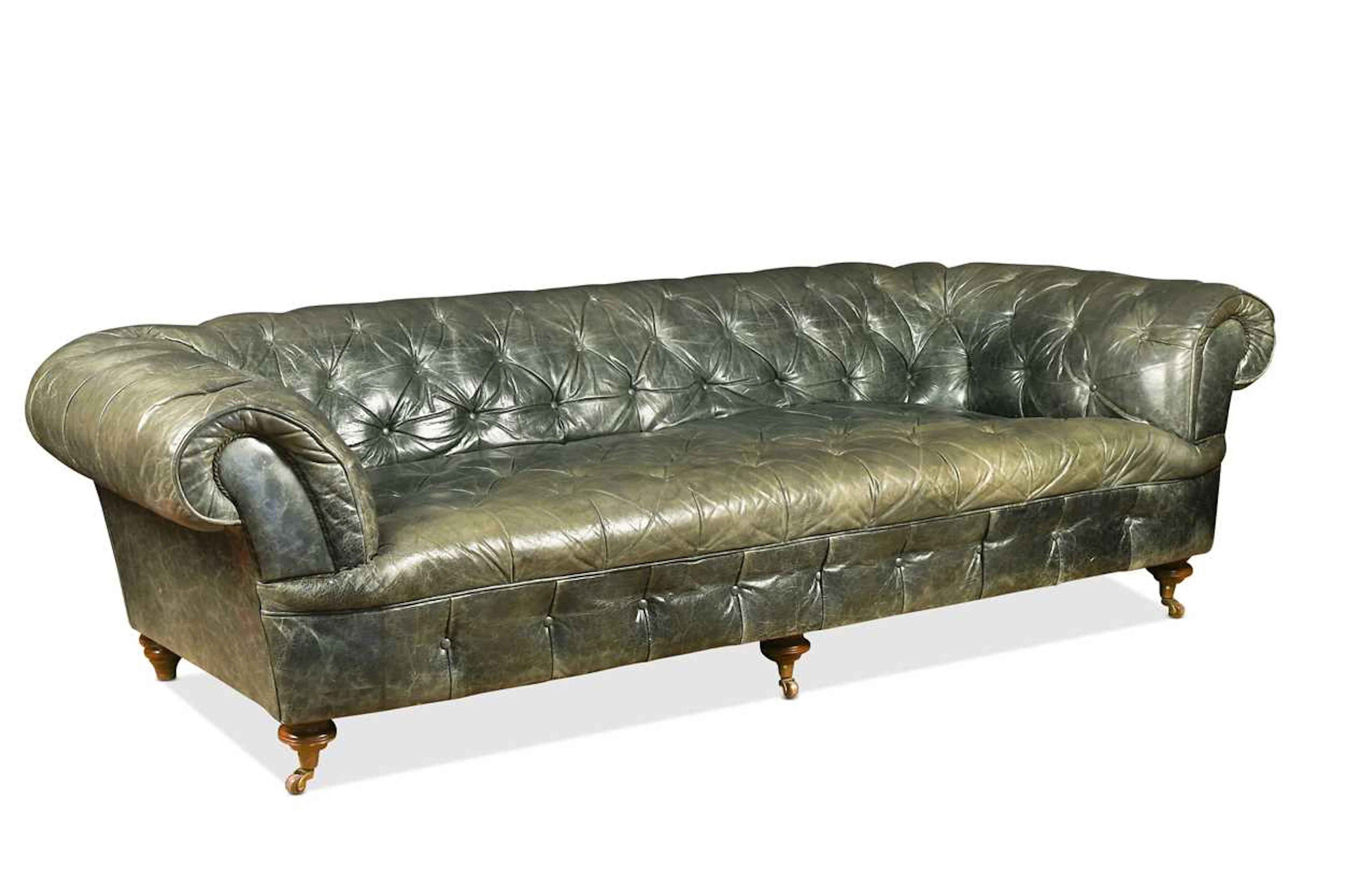 A green leather three seat Chesterfield sofa, 20th century