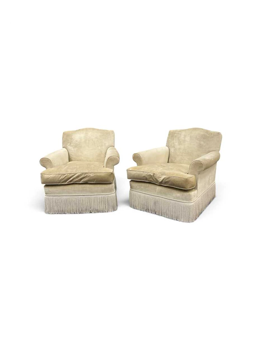 A pair of upholstered armchairs