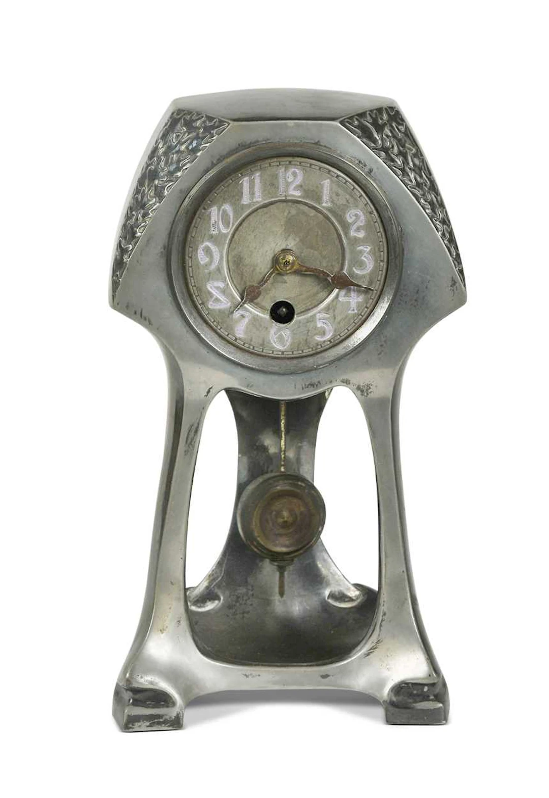A Continental Art Nouveau pewter mantle clock