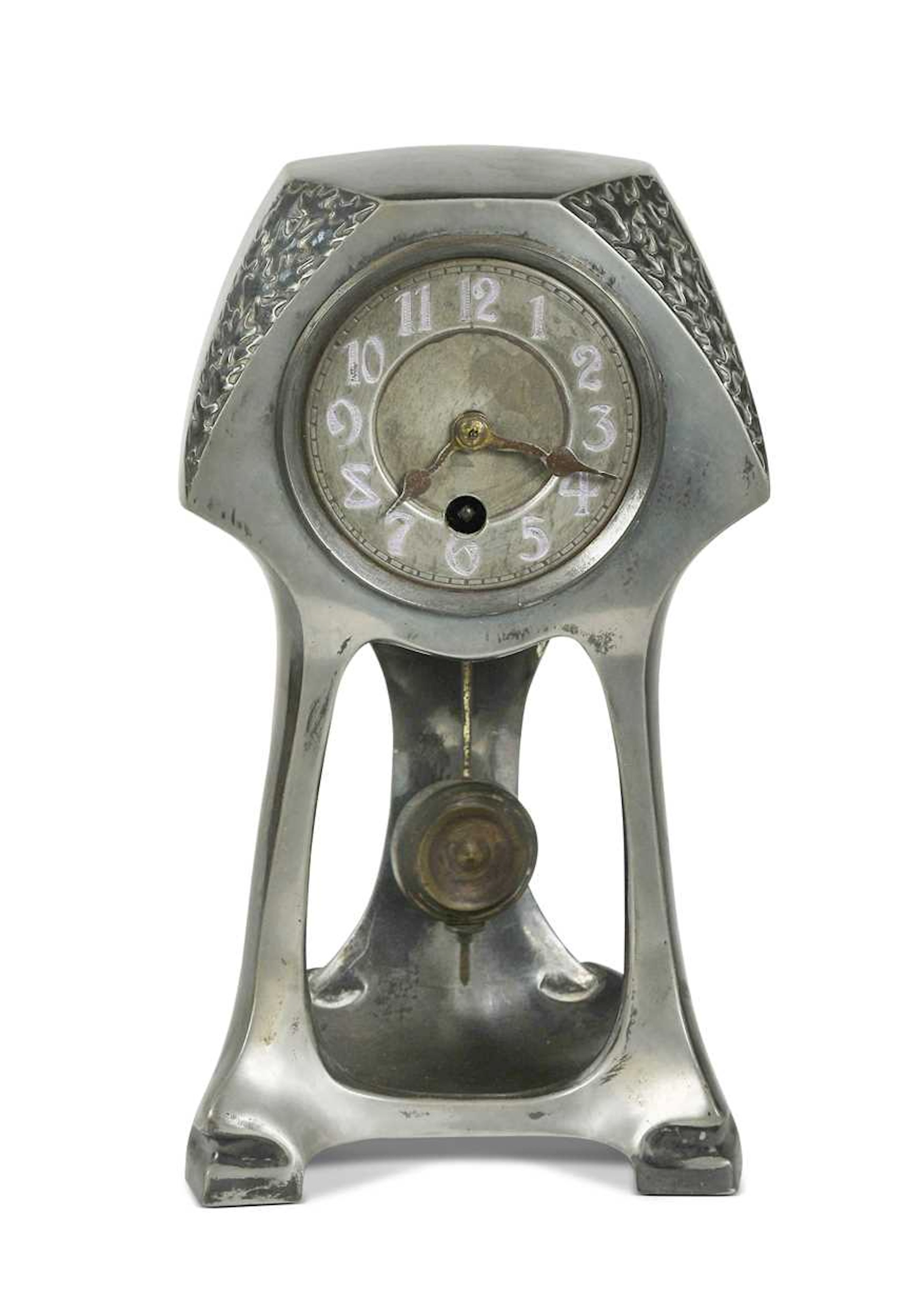 A Continental Art Nouveau pewter mantle clock