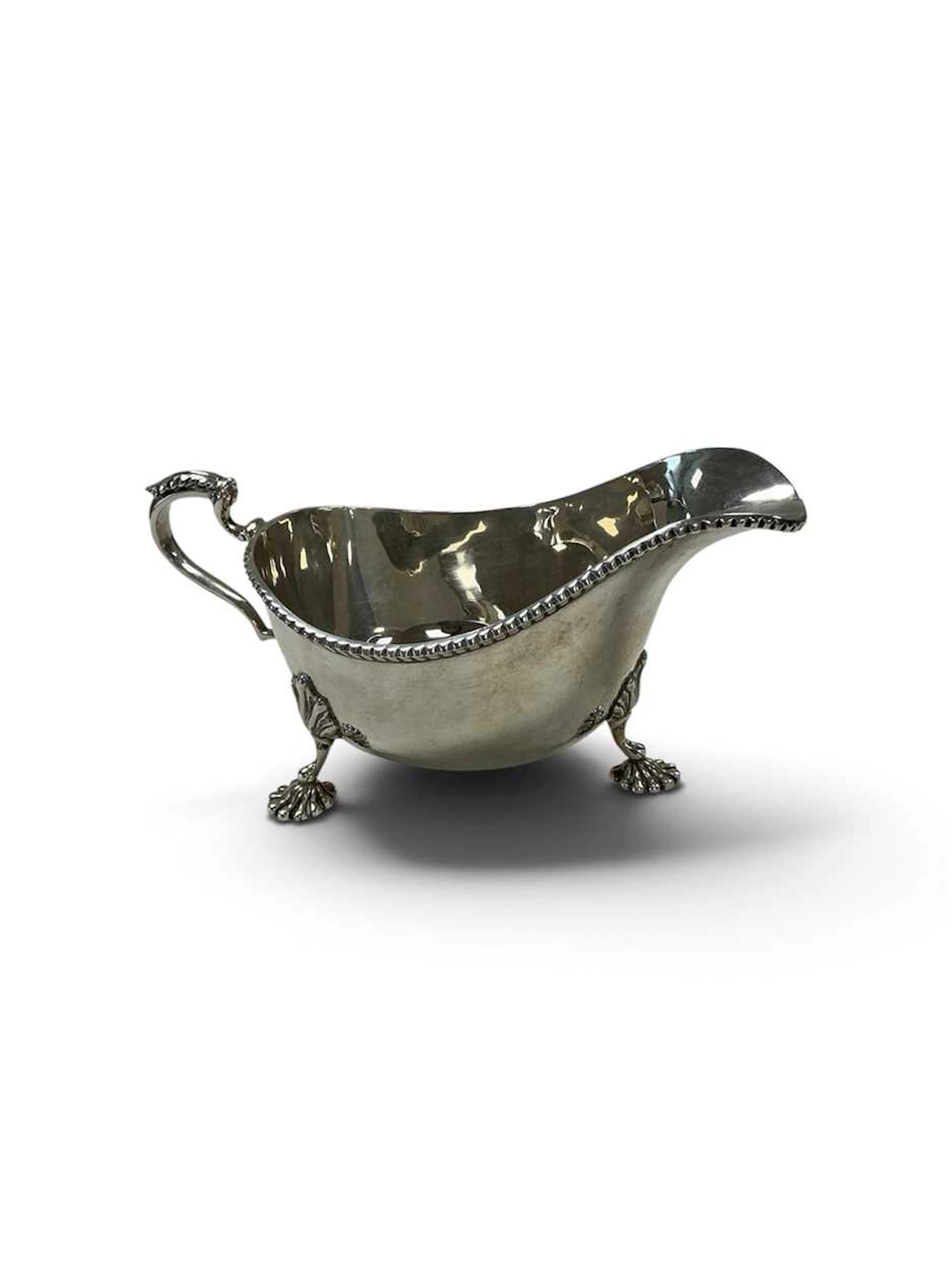 Silver sauce boat in Georgian style
