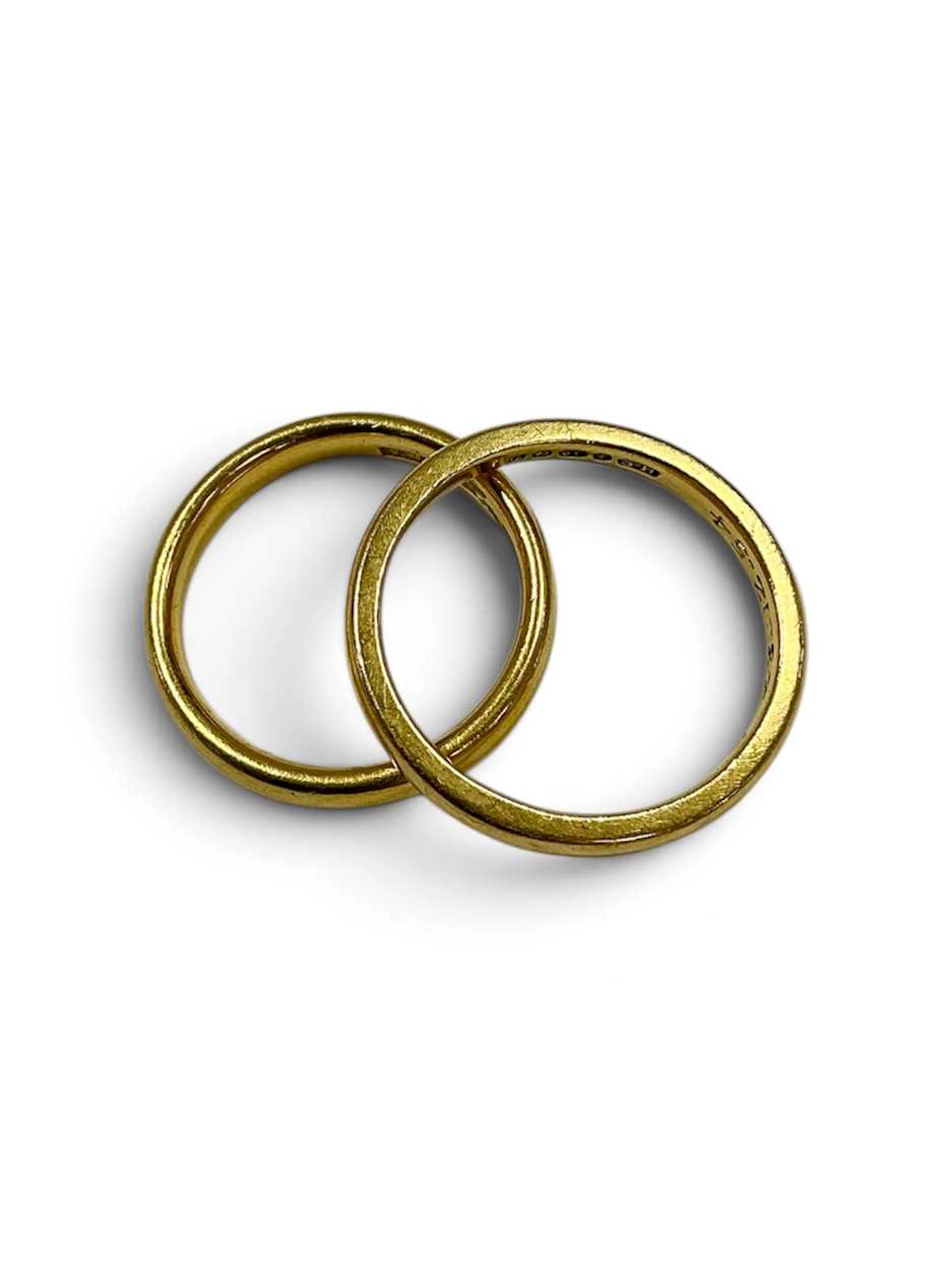 Two hallmarked 22ct gold wedding bands