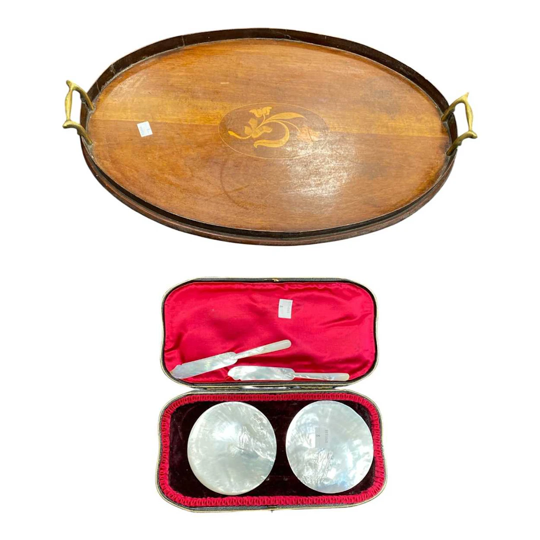 An Edwardian oval mahogany tray 56 x 35cm and a pair of...