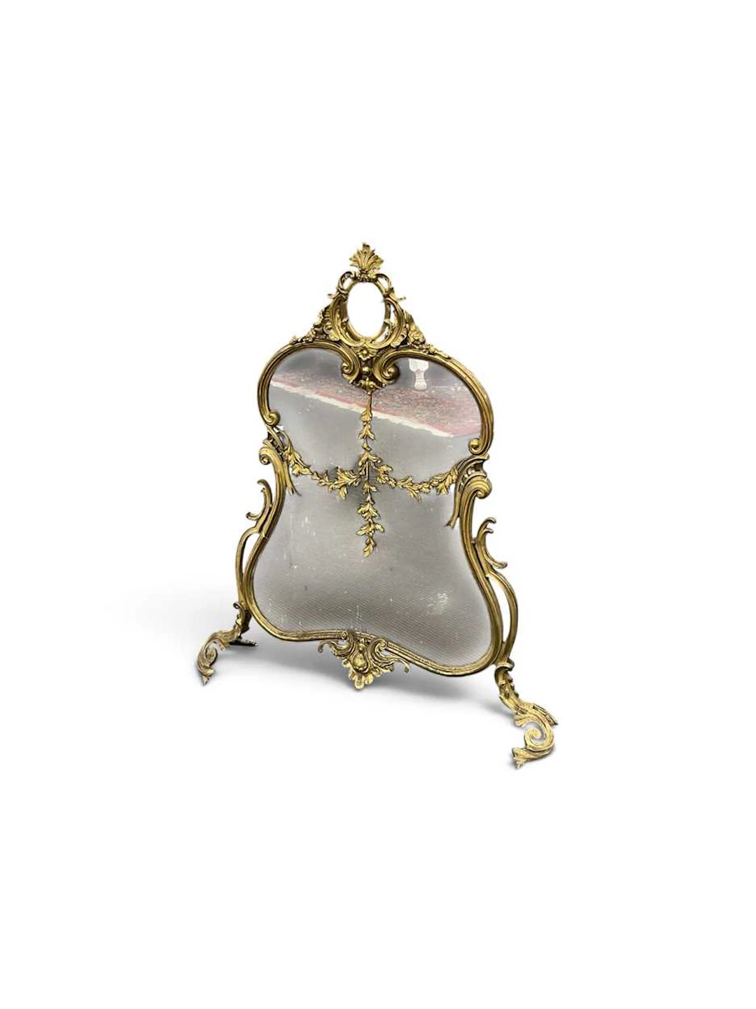 A Rococo style gilt metal spark guard