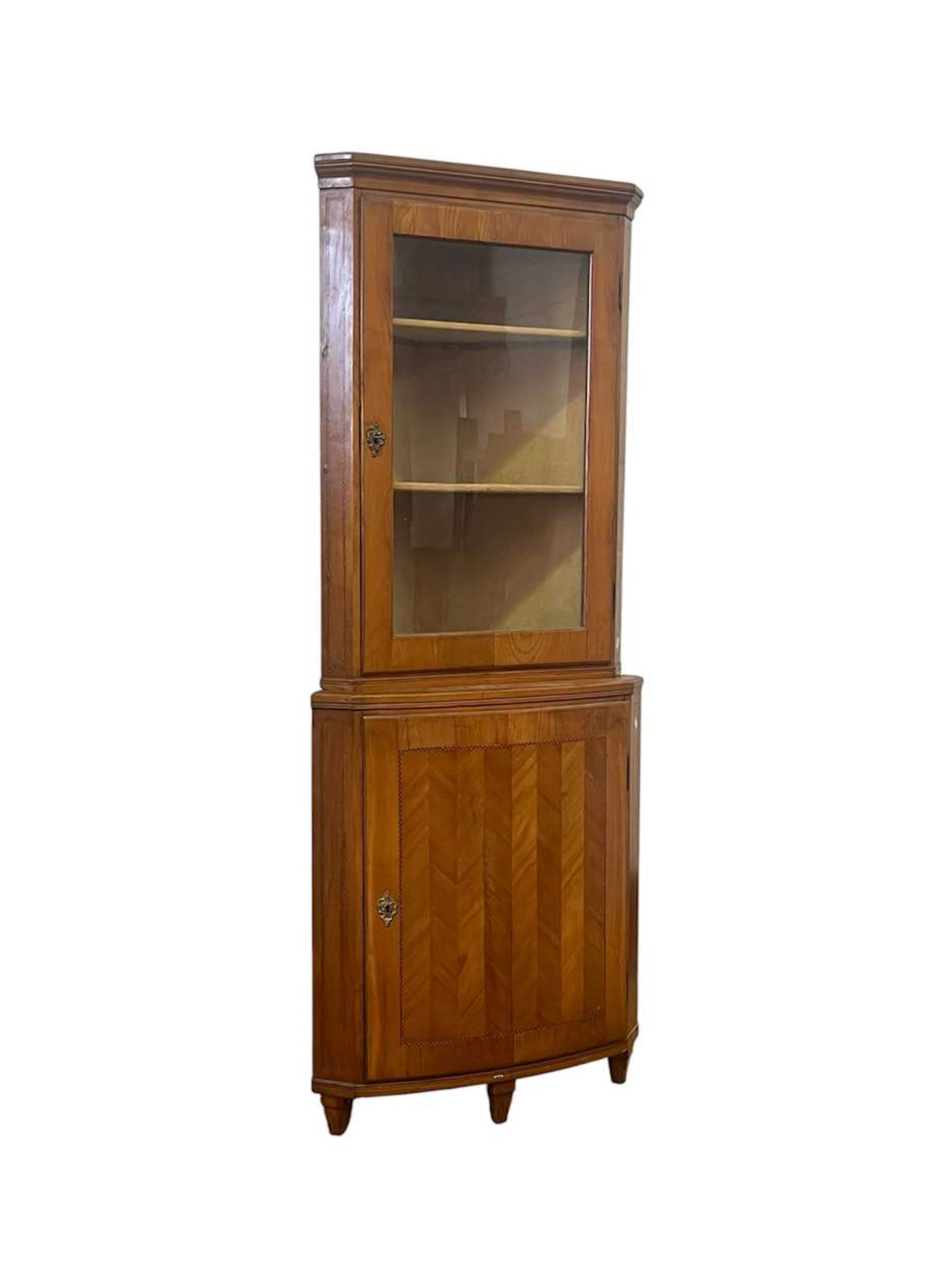 A Scandinavian floor standing corner cupboard with single...