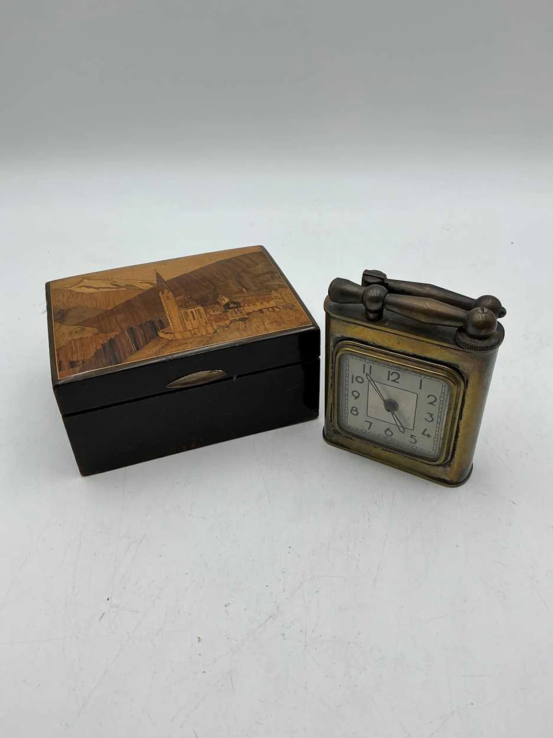 A brass combination clock table lighter mid 20th century