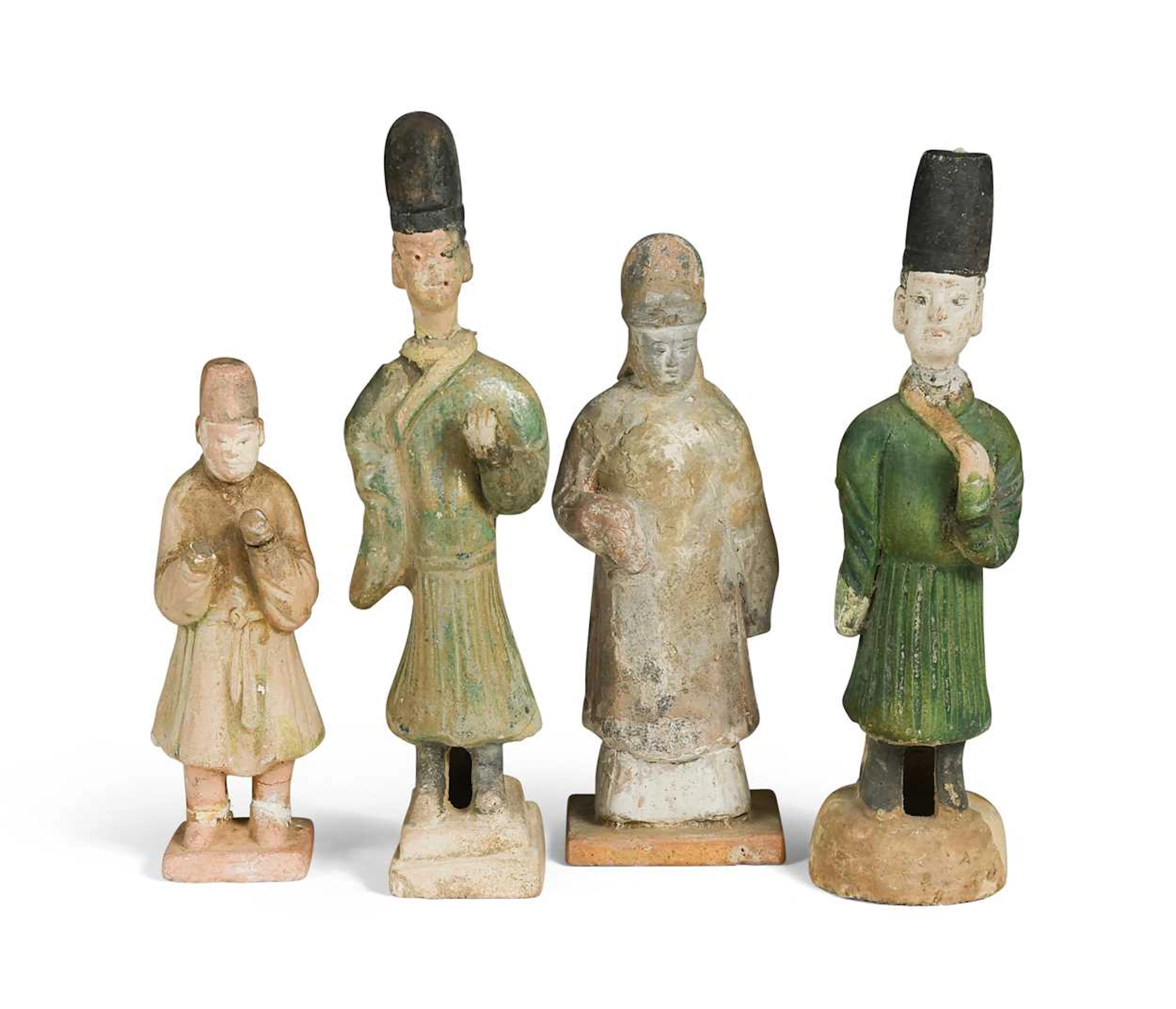 Two Chinese partly glazed sancai pottery tomb attendants, mingqi