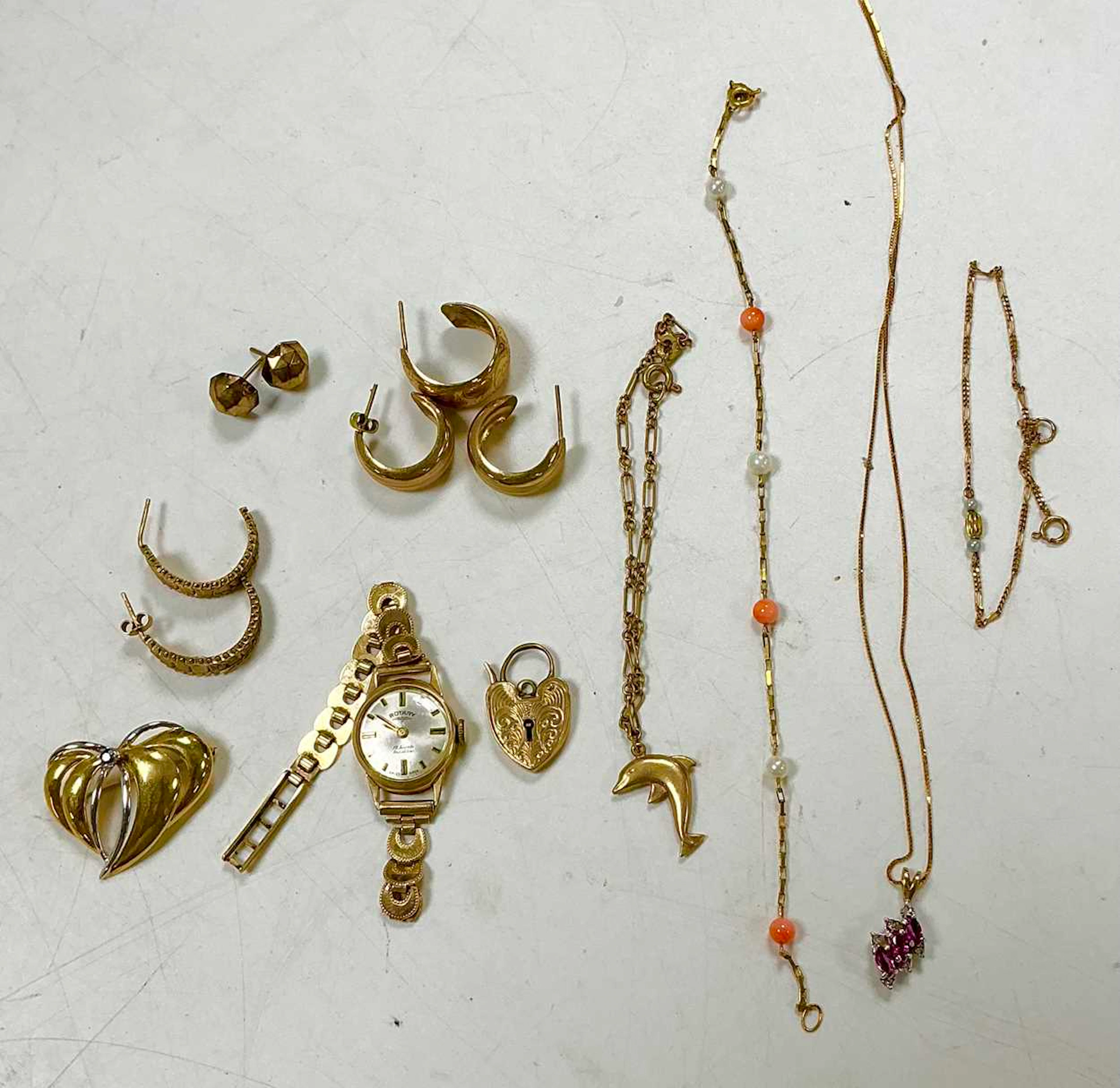 A collection of jewellery to include three pairs of earrings