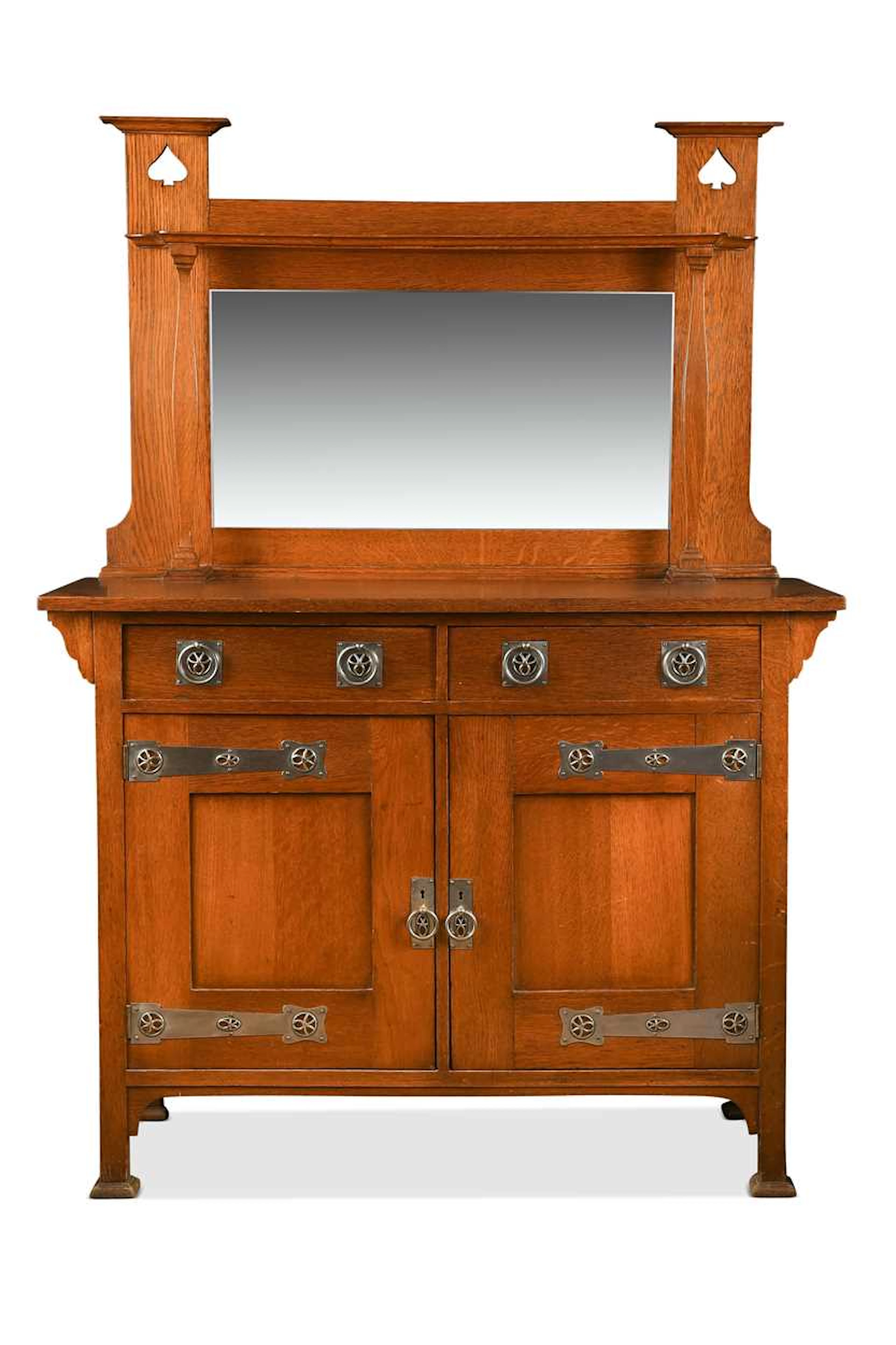 In the manner of Shapland & Petter, an Arts & Crafts oak sideboard