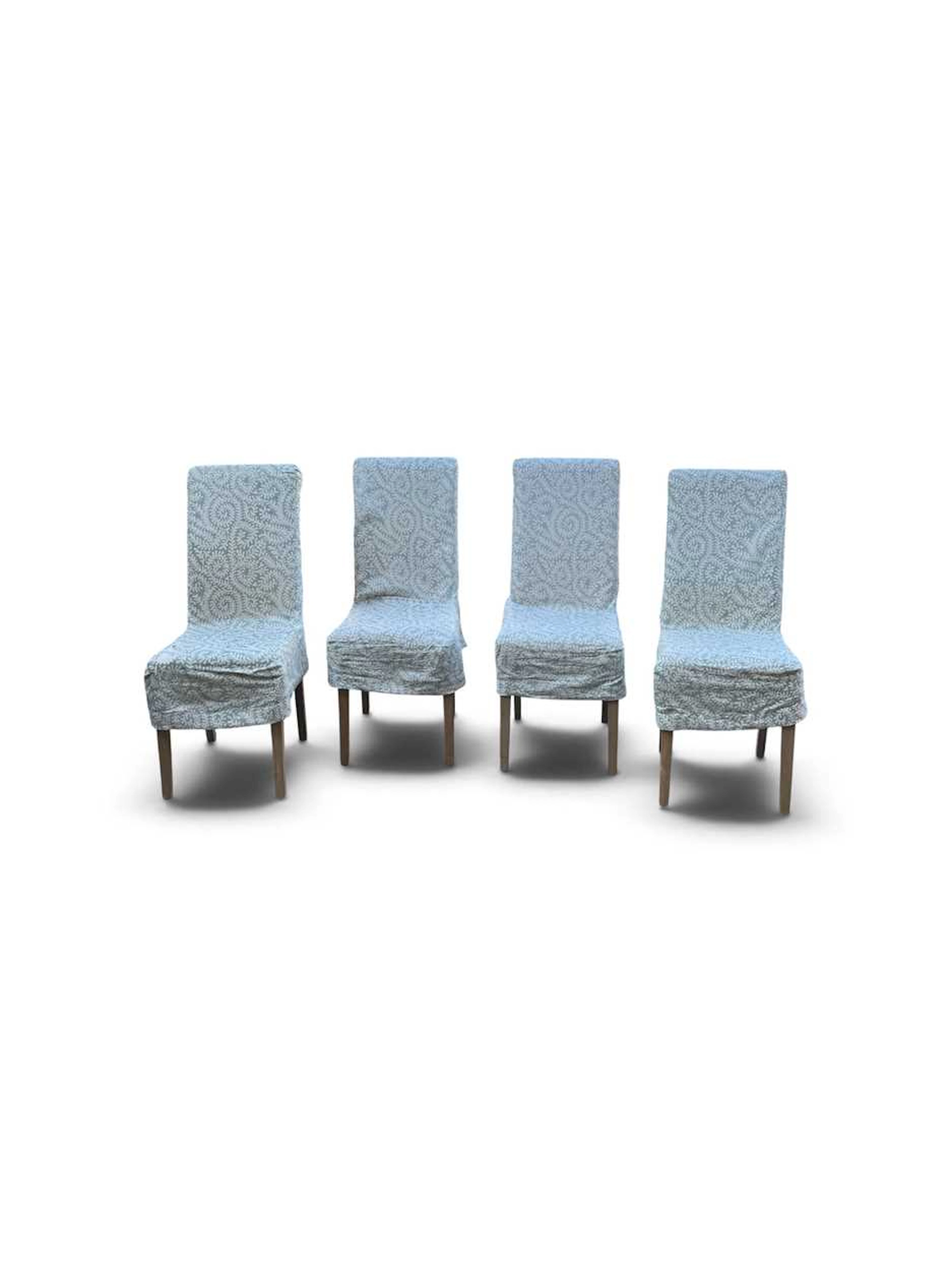 A set of four OKA high back dining chairs