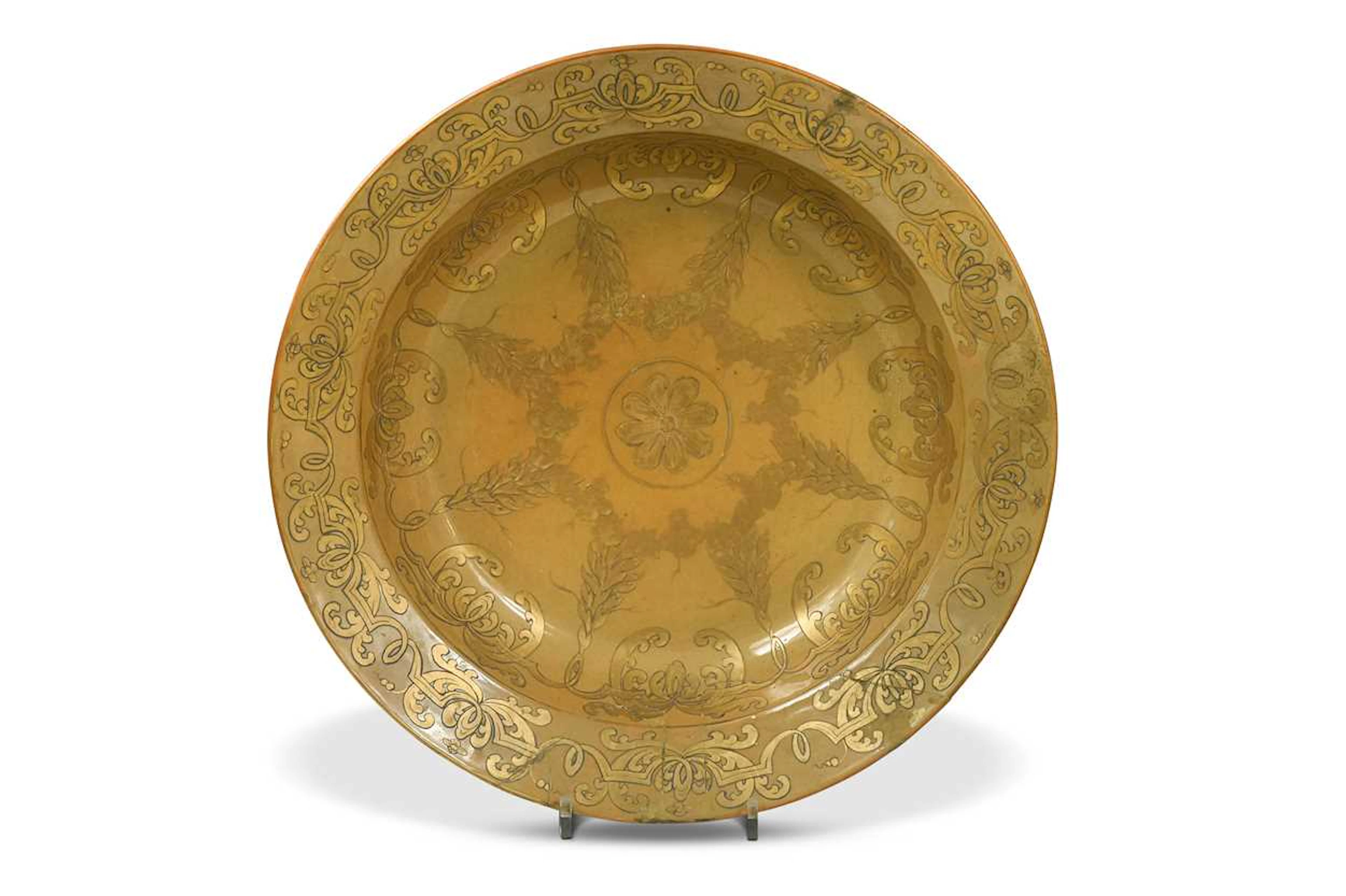 A Chinese porcelain dish, decorated in Europe