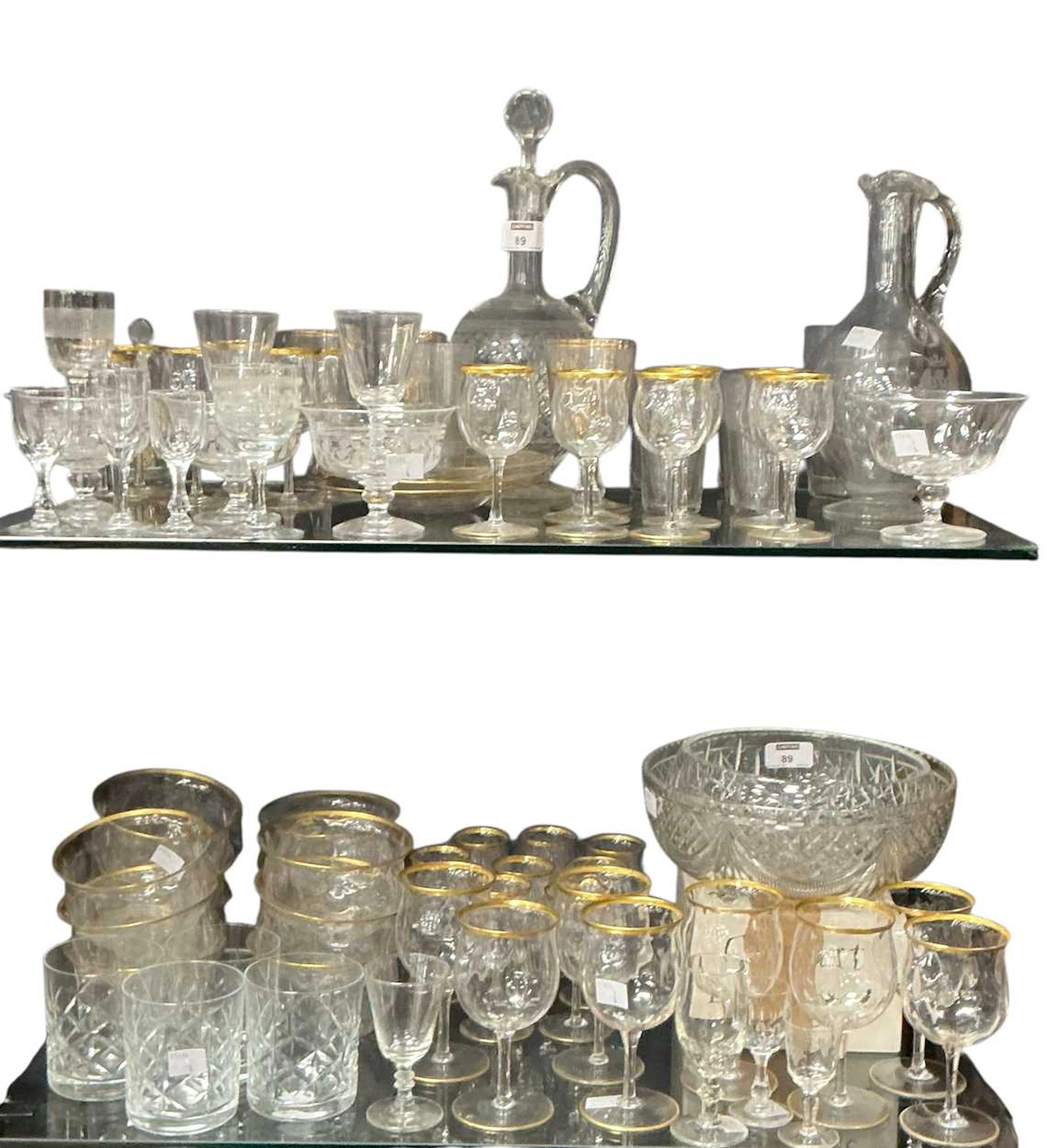 A set of 20th century drinking glasses with gilt rims