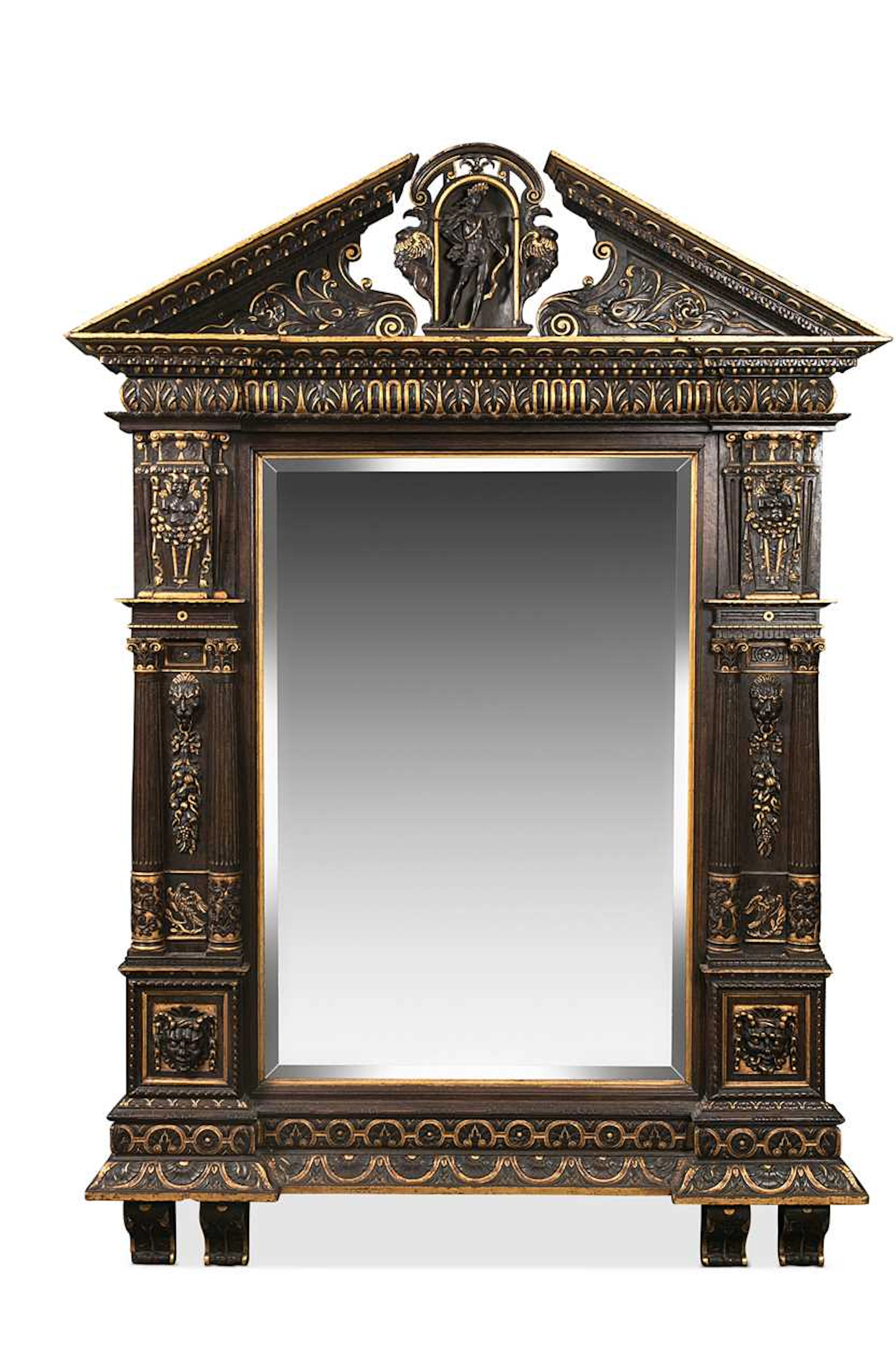 A Renaissance style oak and parcel gilt wall mirror