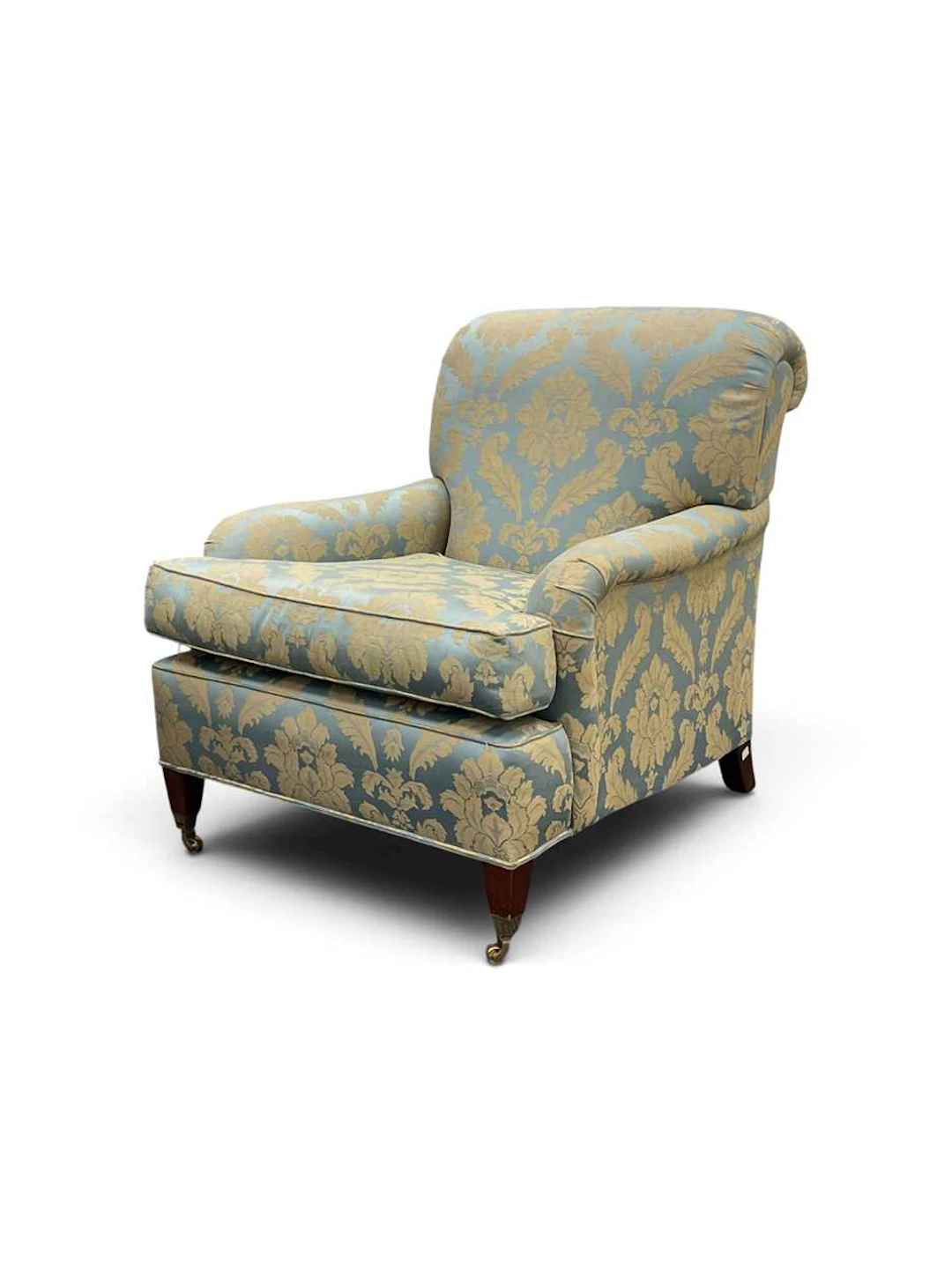 A Howard style deep armchair