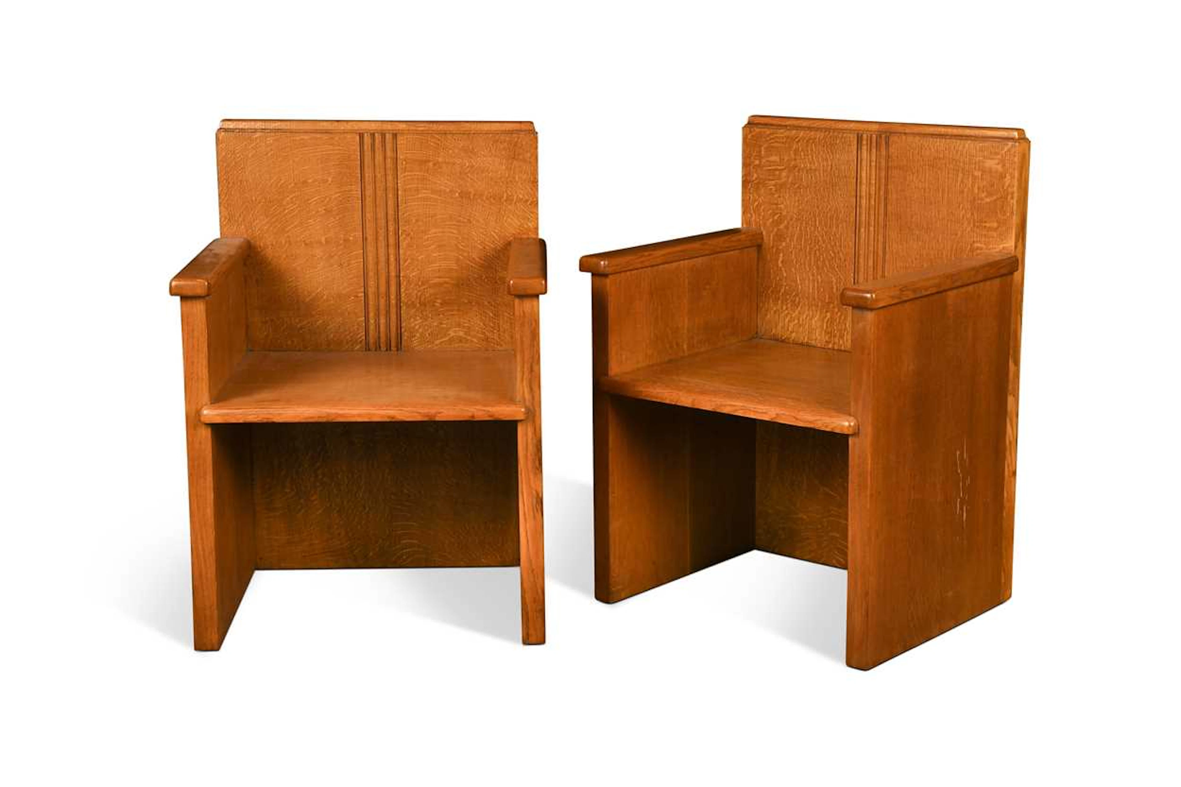 A pair of Art Deco solid oak armchairs, circa 1930s