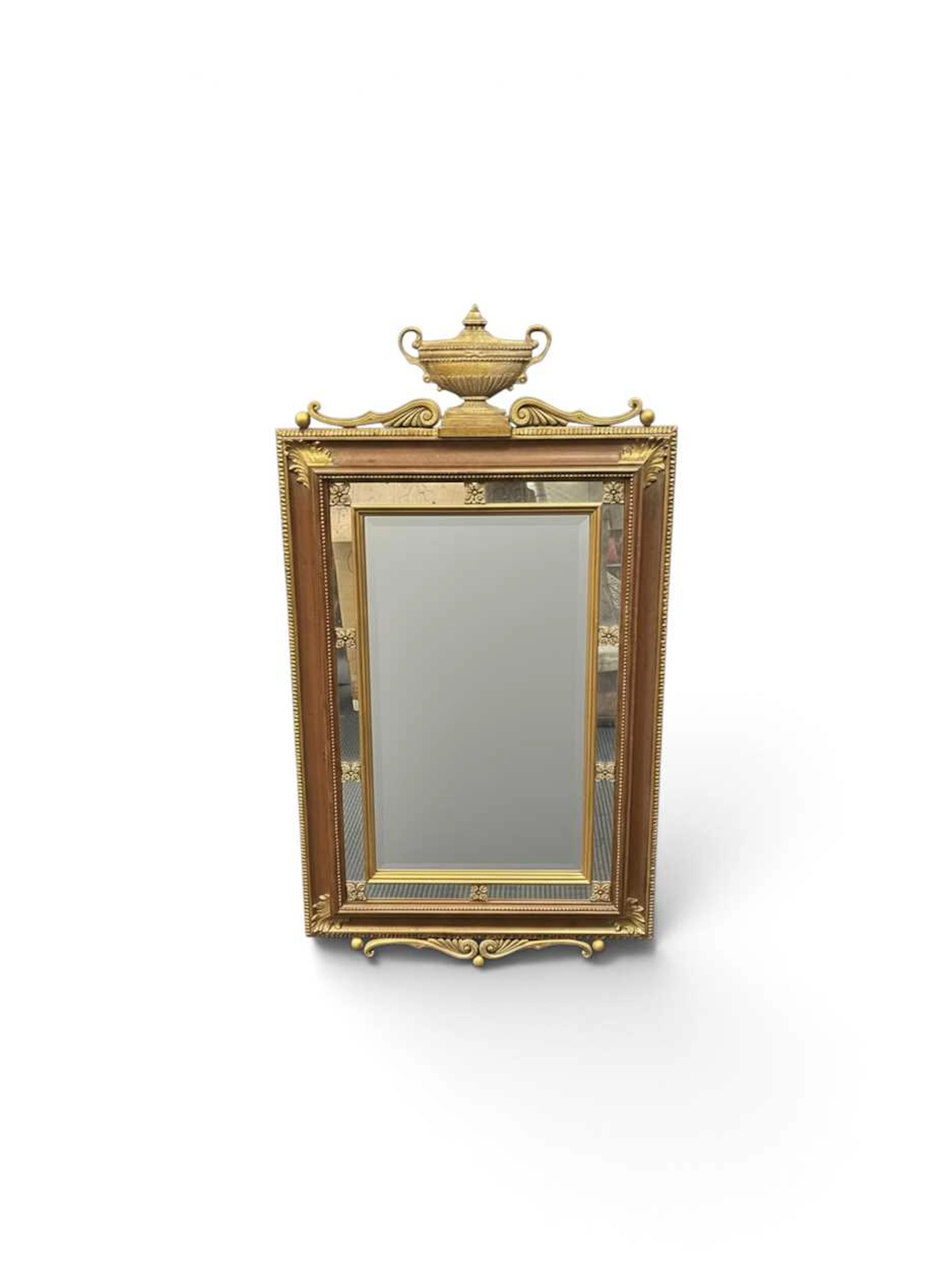 A Neoclassical style composite framed parcel gilt wall...