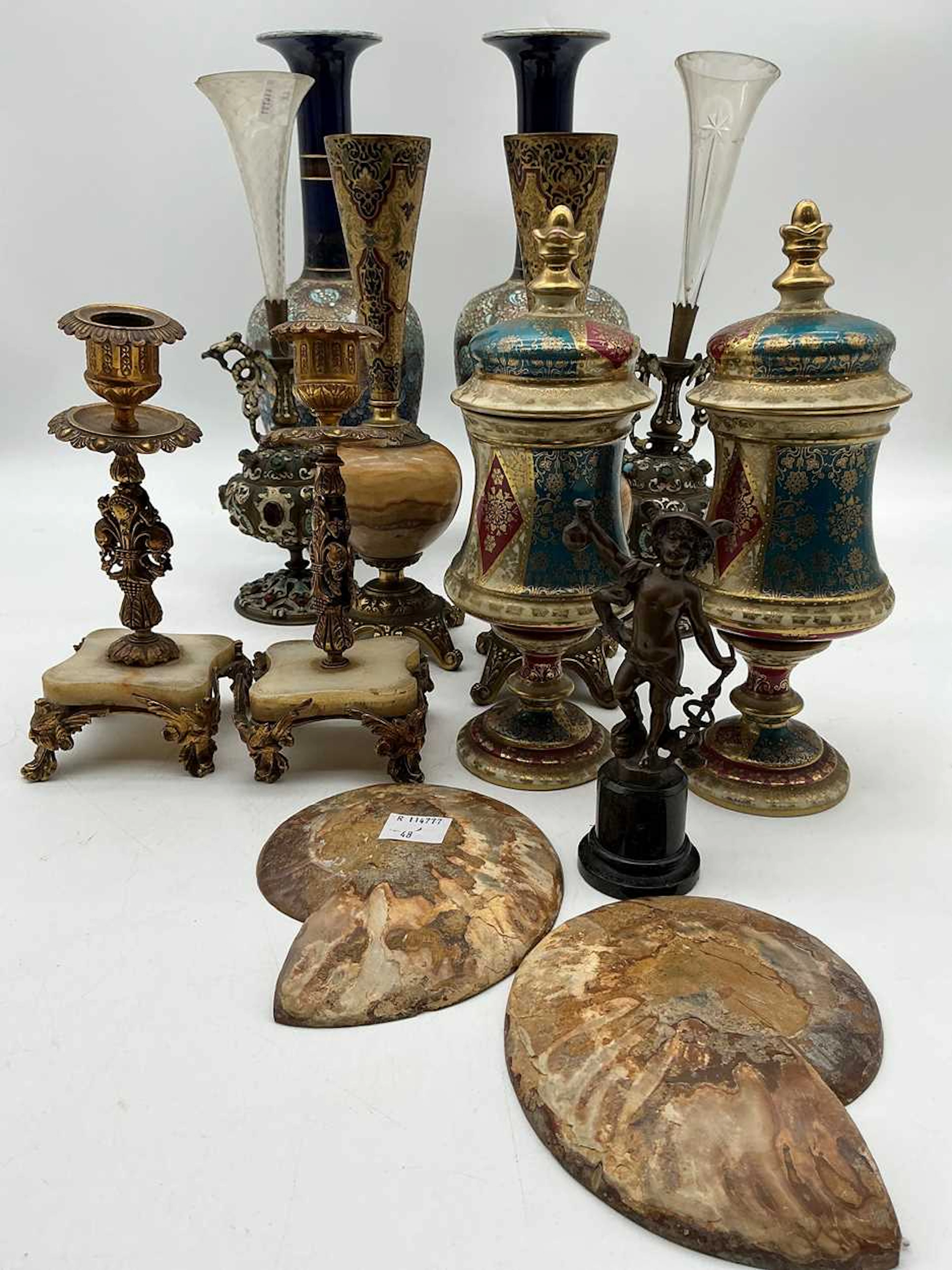 A tall pair of waisted vases with flared rims