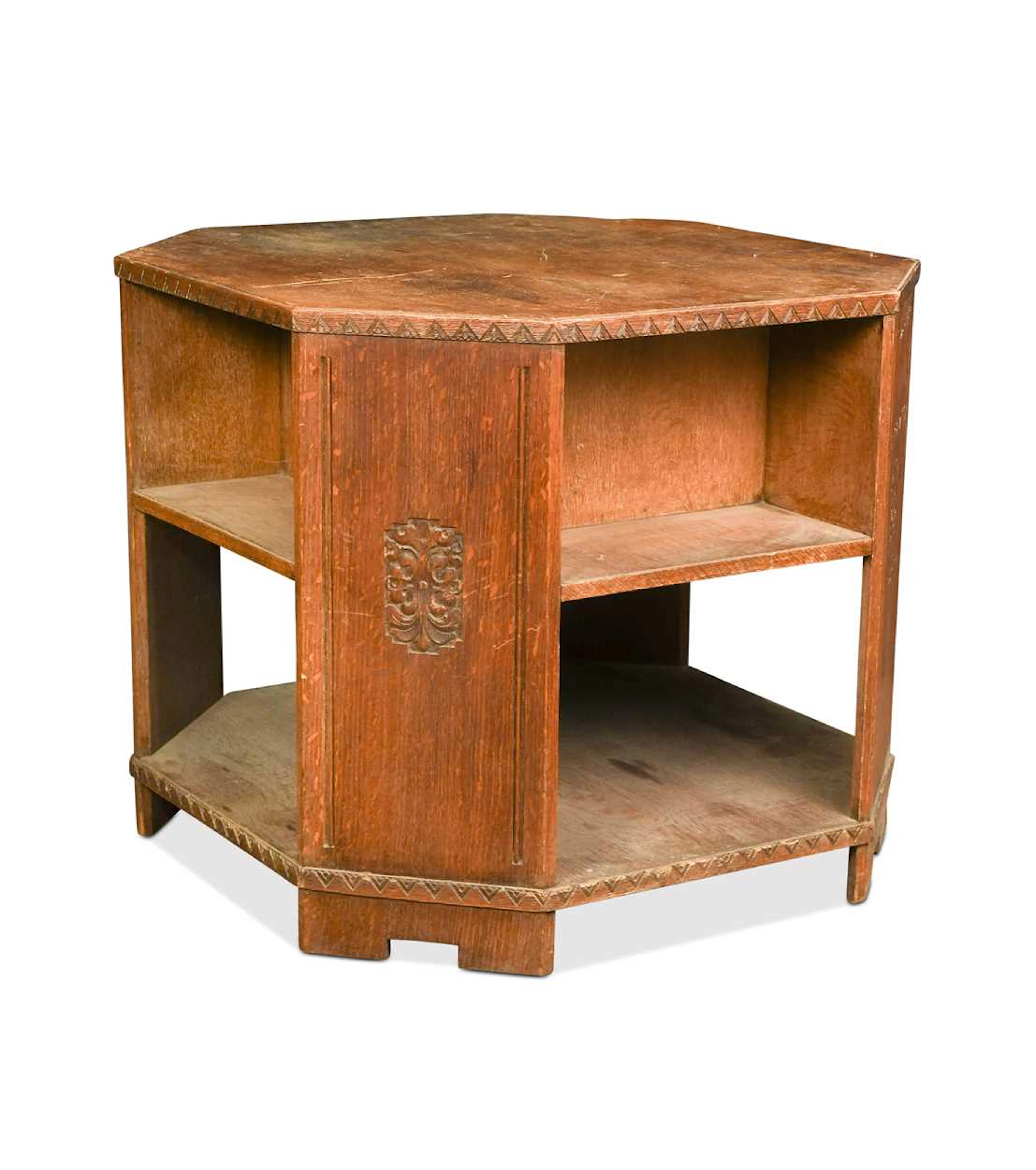 An Art Deco oak book table of country house proportions
