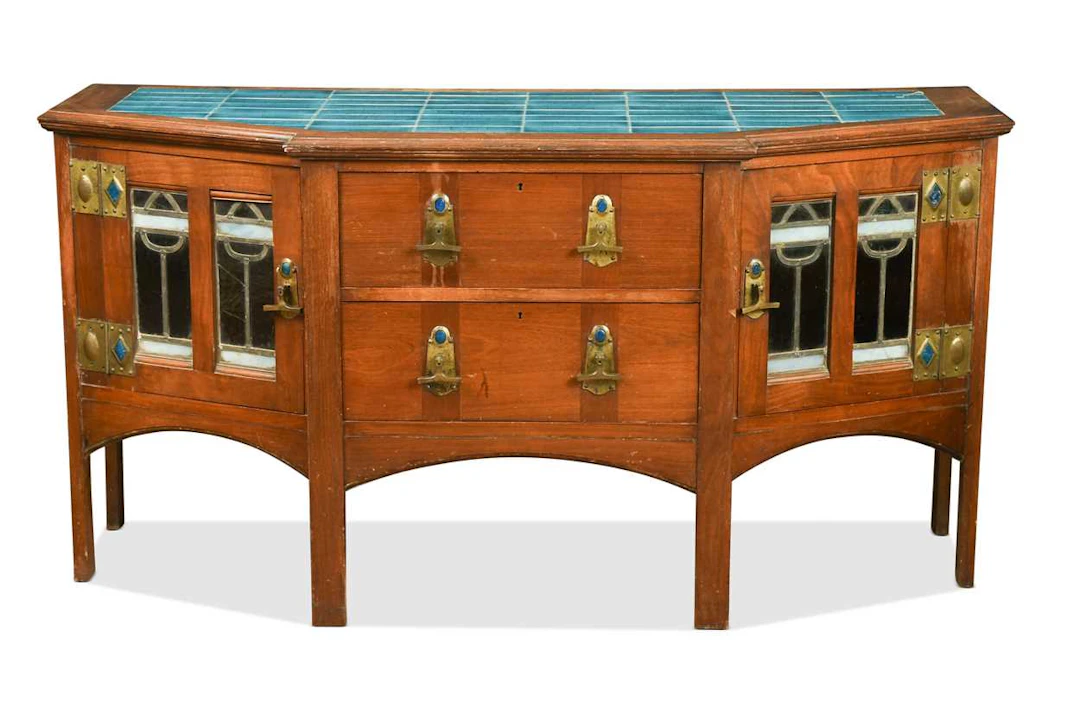An Arts & Crafts tile top mahogany side cabinet