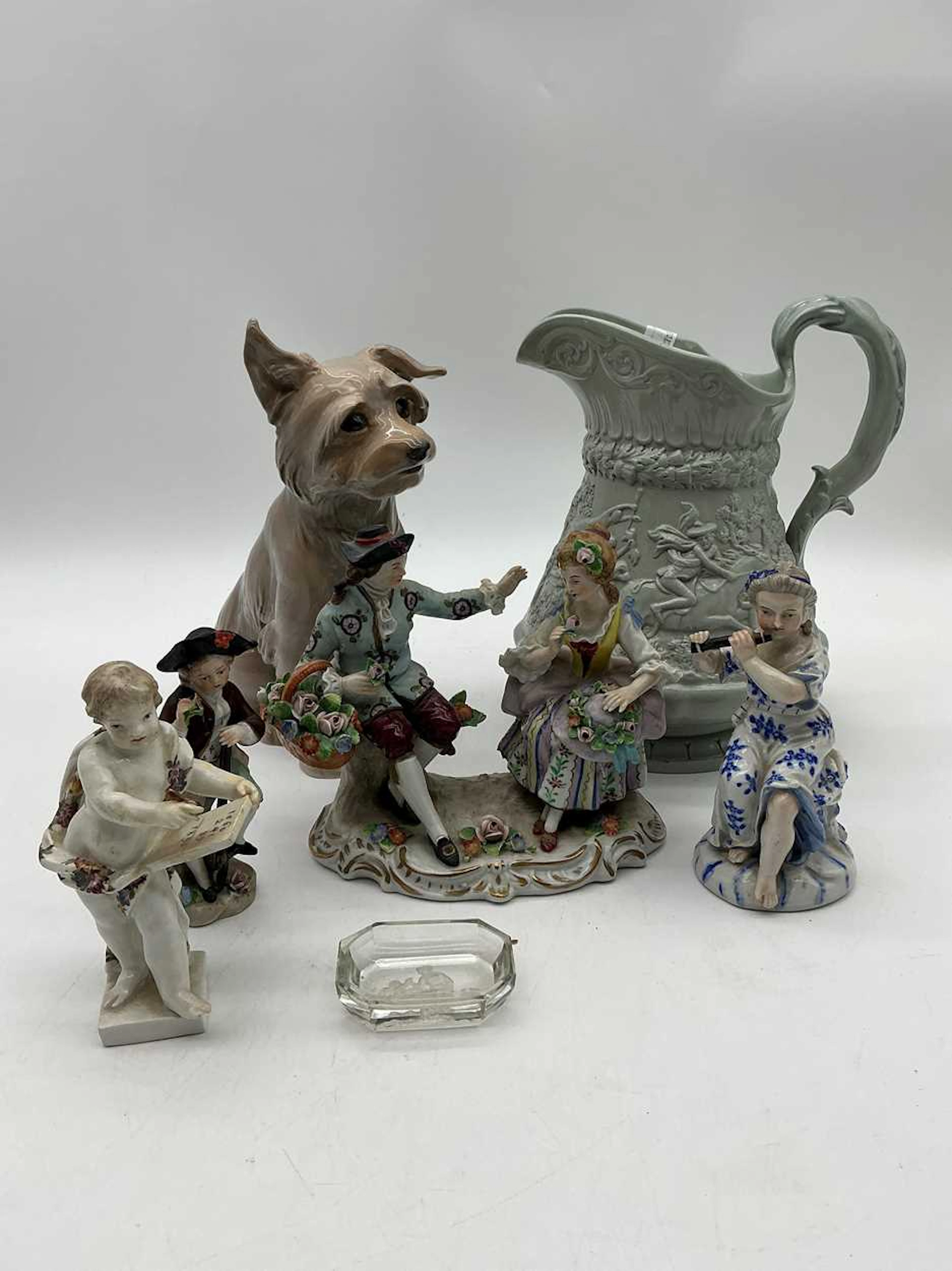 A group of decorative mainly Continental figurines
