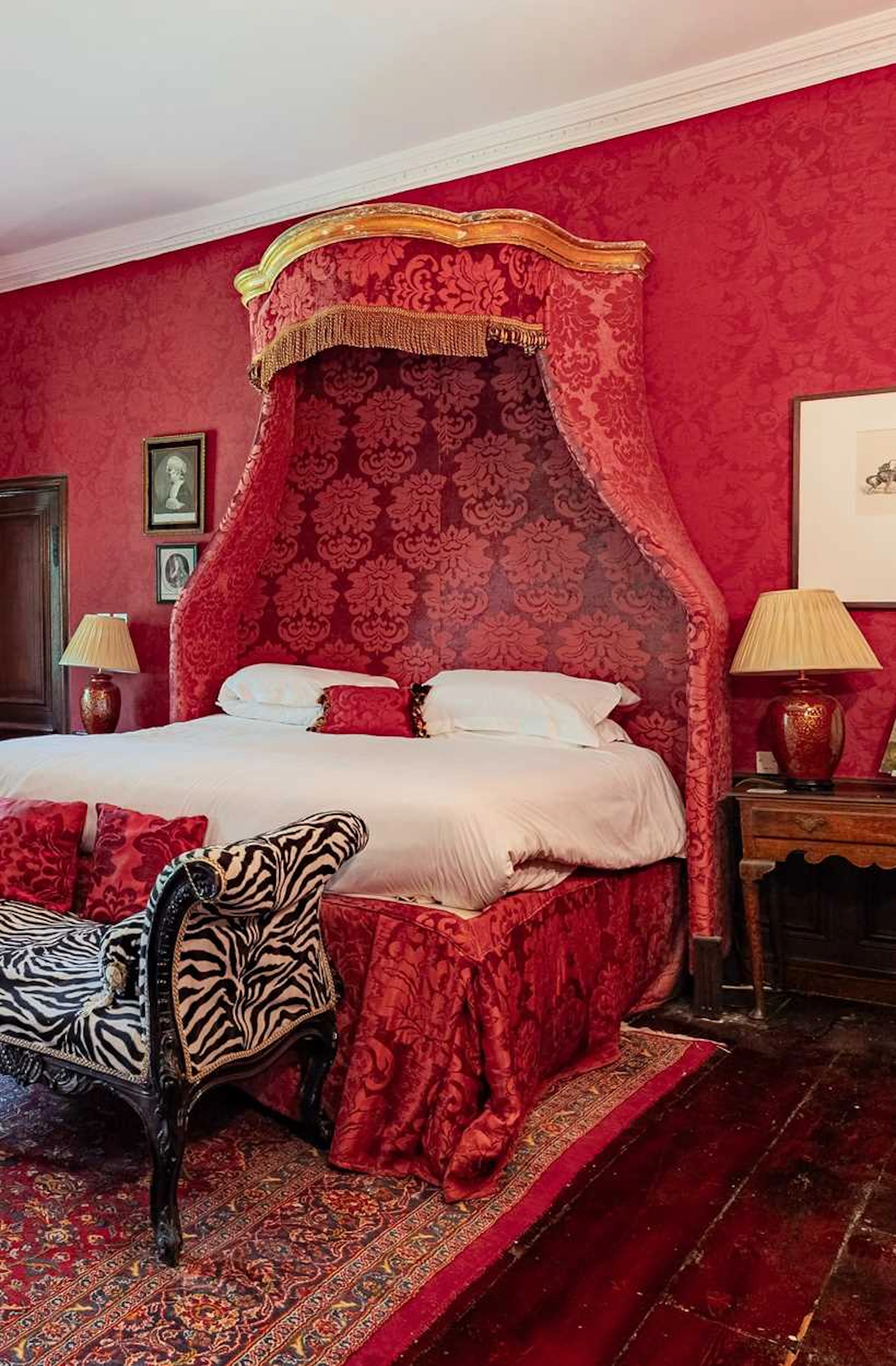 A Baroque style parcel gilt canopy bed