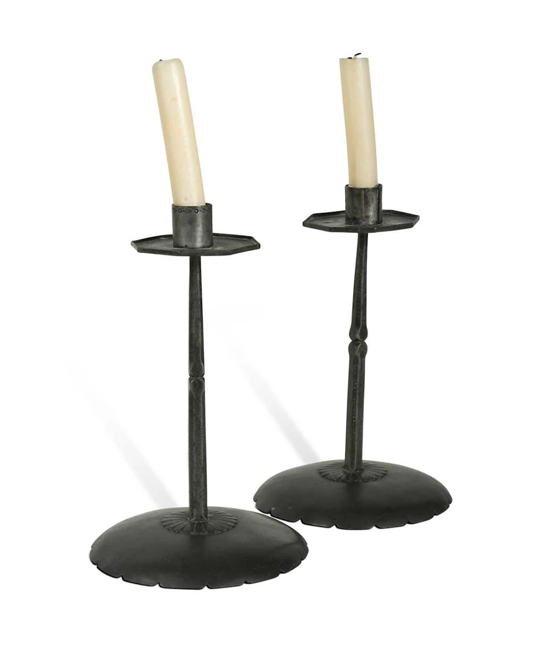 Ernest Gimson (1864-1919), a pair of steel candlesticks made by Alfred