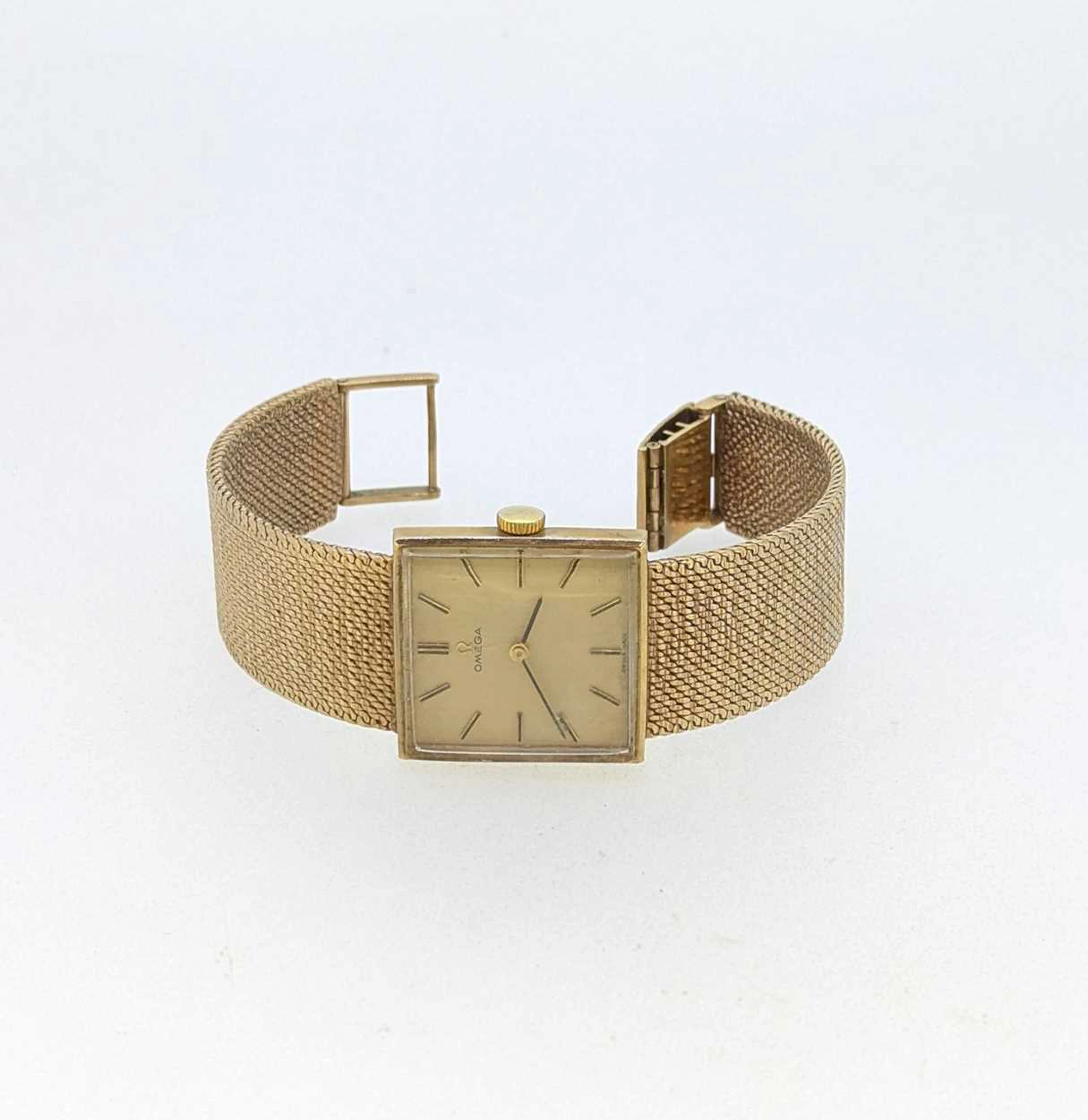 A hallmarked 9ct gold Omega watch