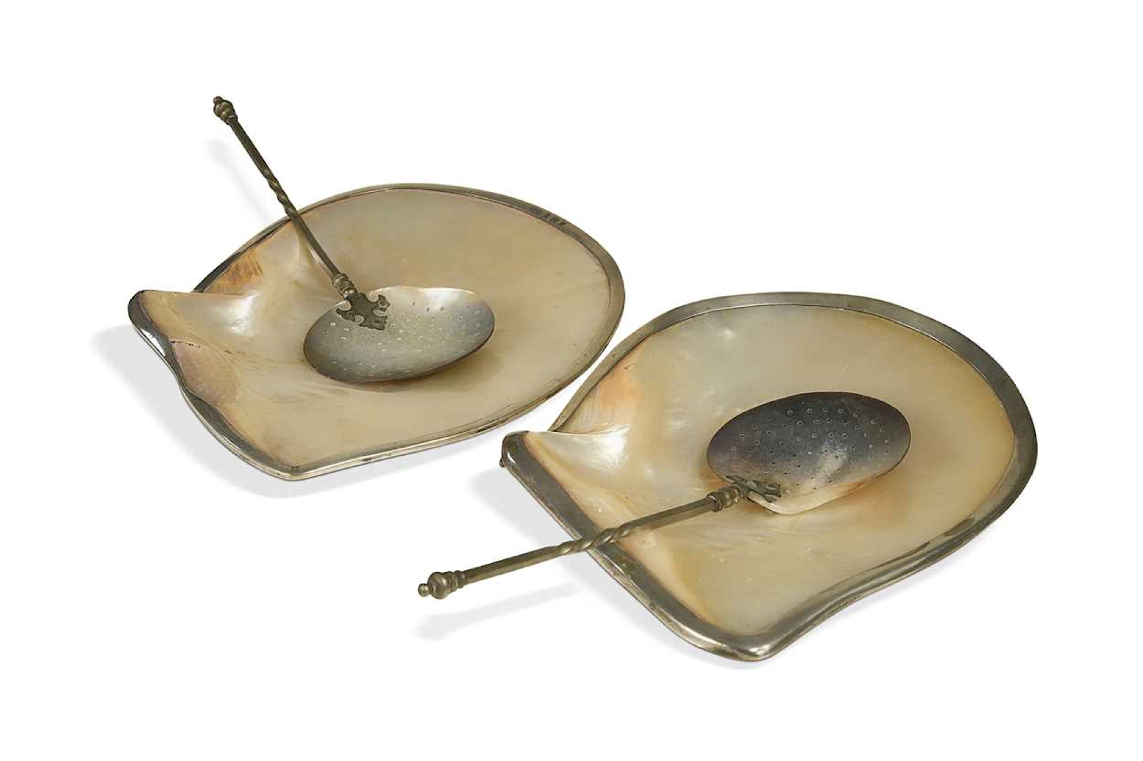 Two similar silver mounted abalone type shell dishes