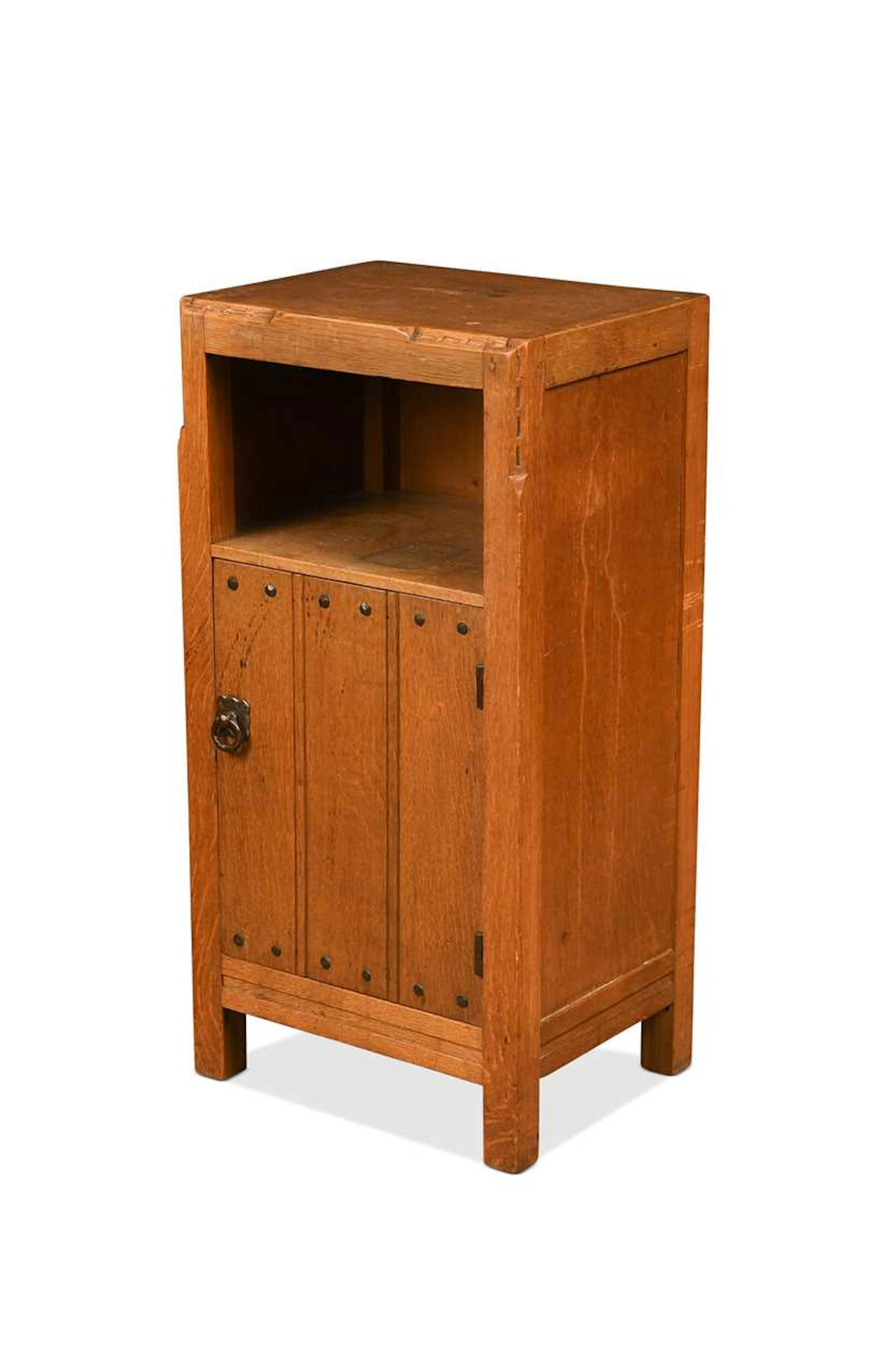 An Arts & Crafts oak bedside