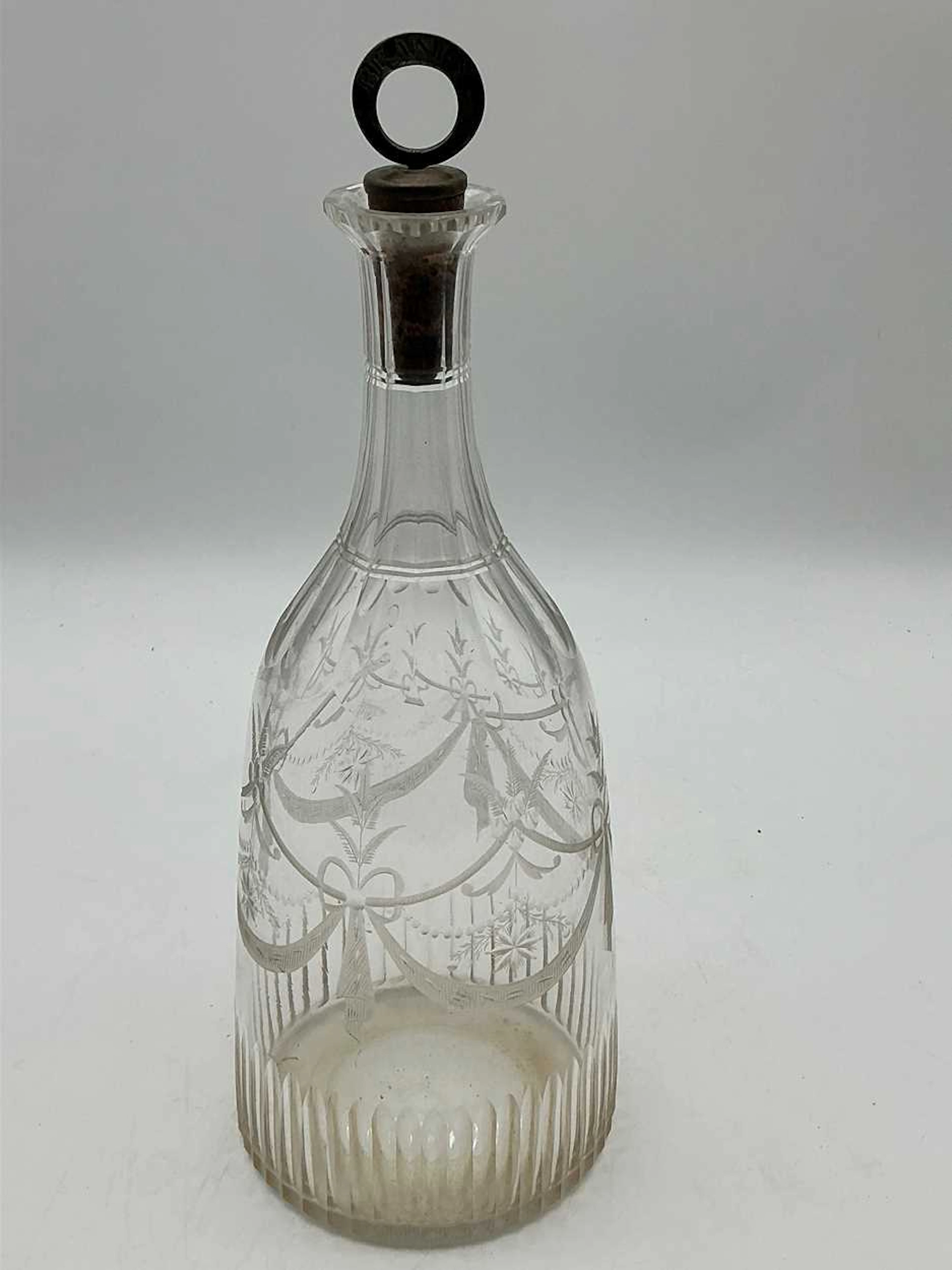 A Regency glass decanter with cork stopper marked 'Brandy'