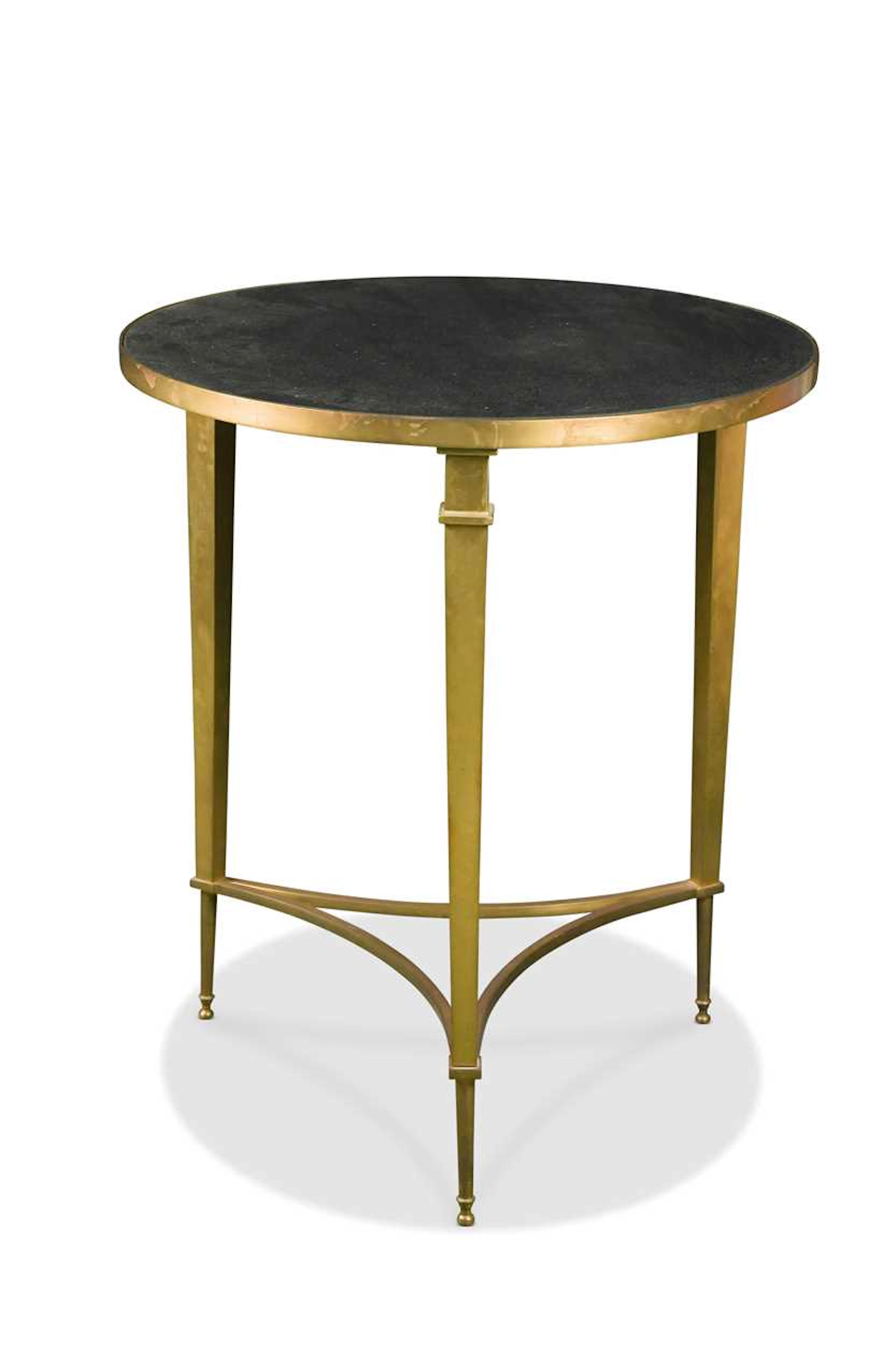 A contemporary brass framed occasional table
