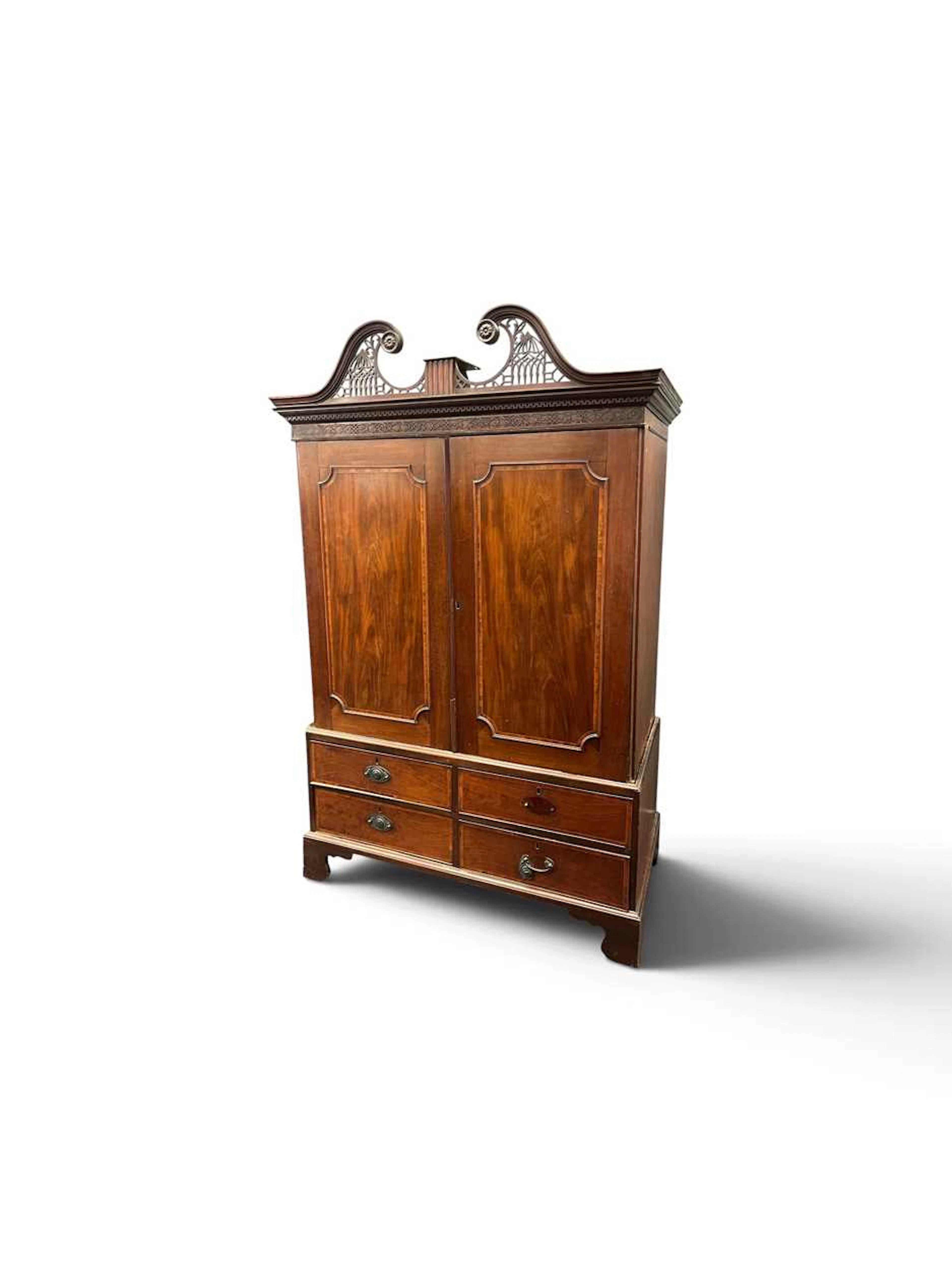A mahogany linen press