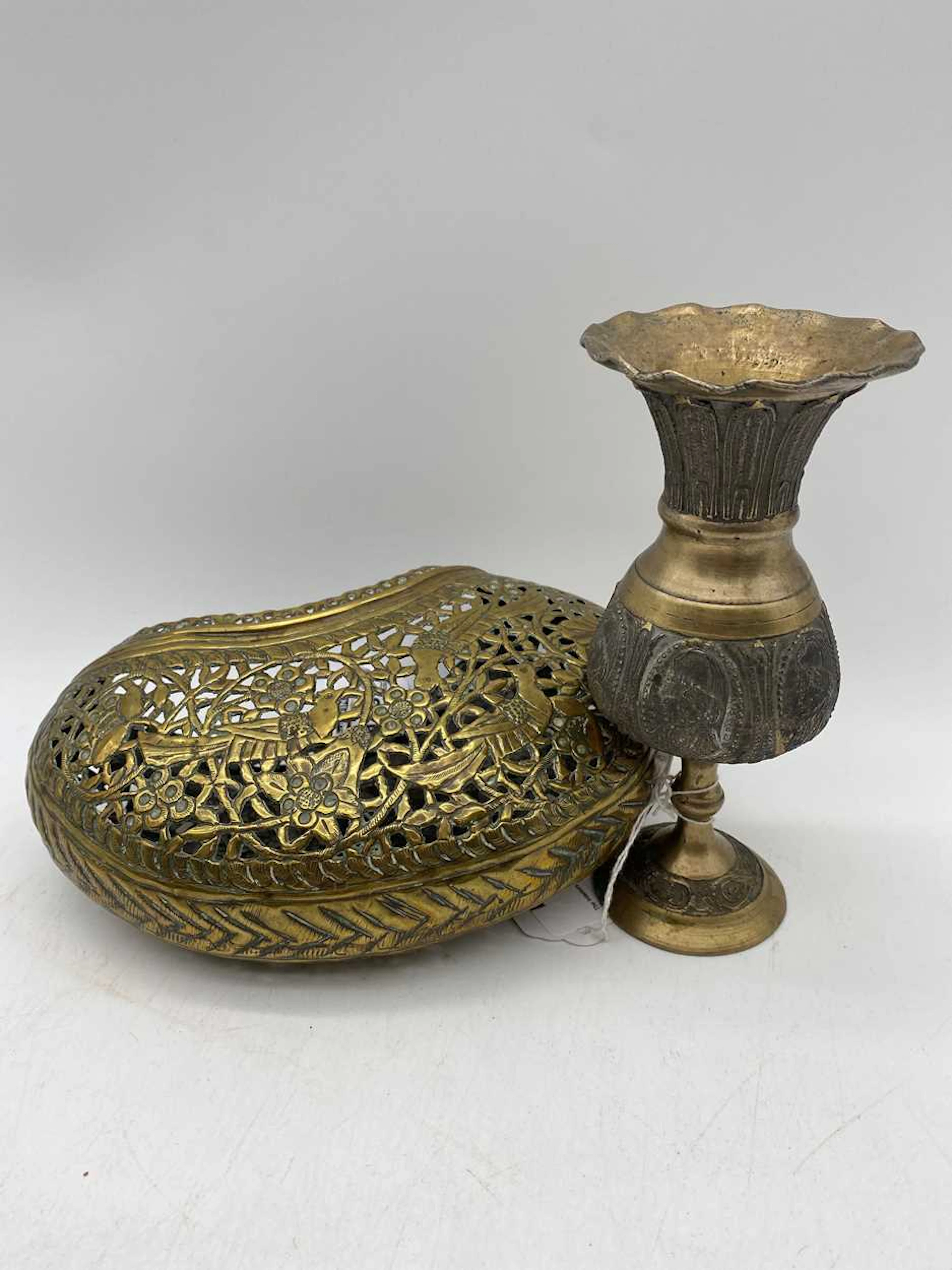 A Persian brass begging bowl 10 x 20 x 6.5cm and goblet 16cm (2)