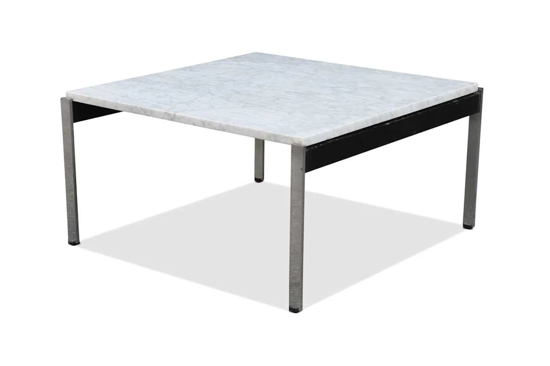 In the manner of Florence Knoll, a marble topped coffee table