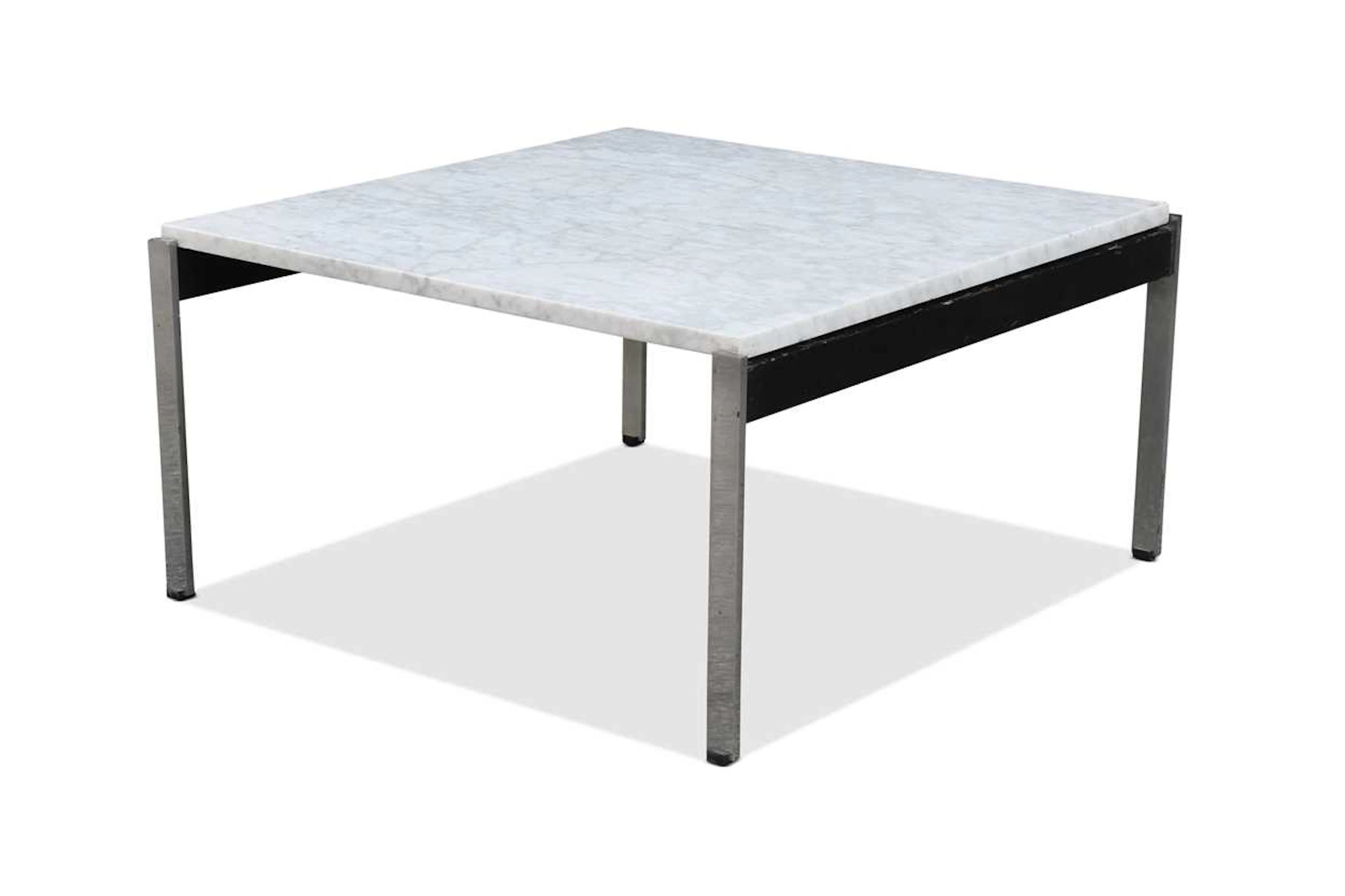 In the manner of Florence Knoll, a marble topped coffee table