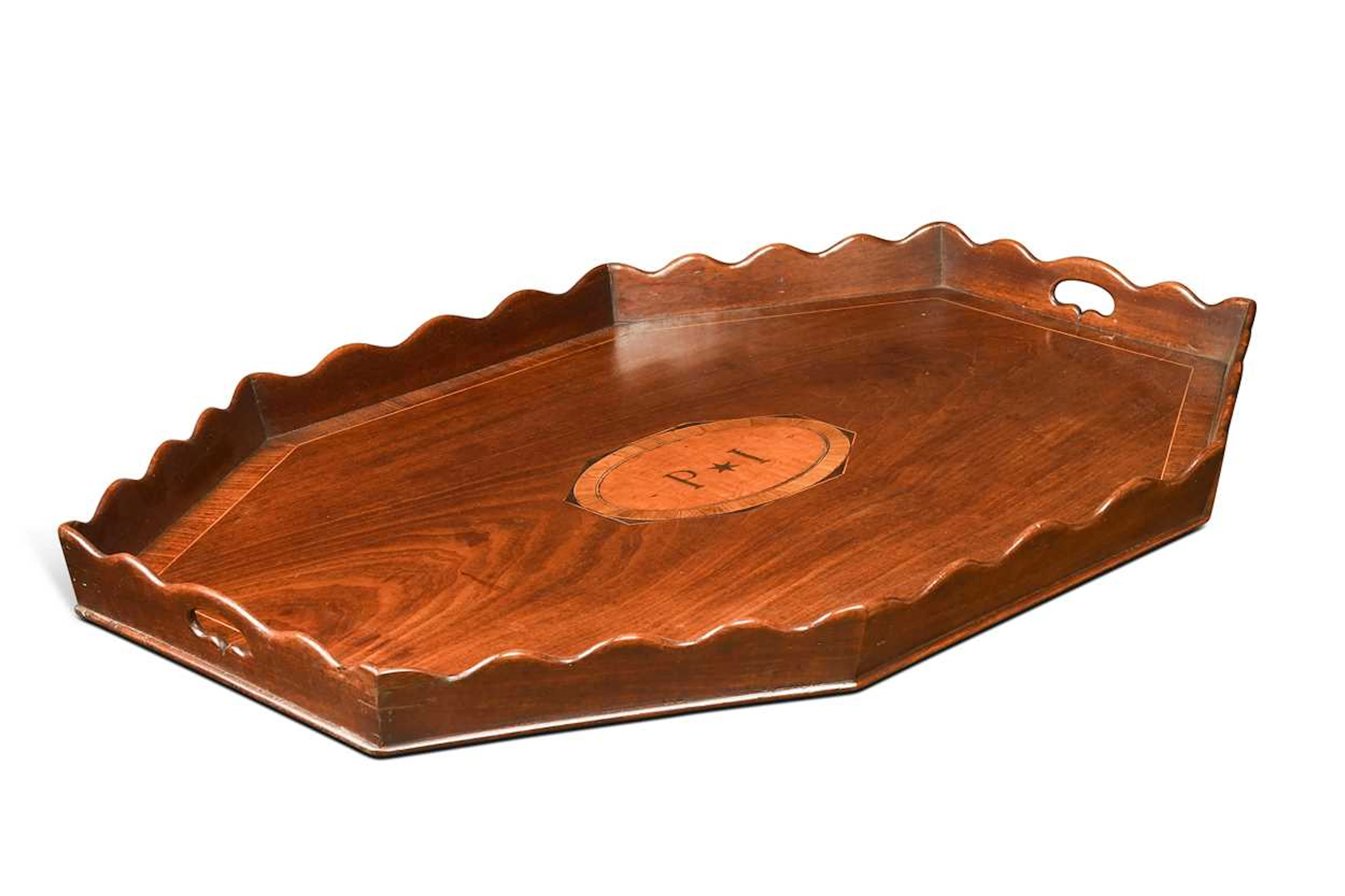 An octagonal mahogany tray, 19th century