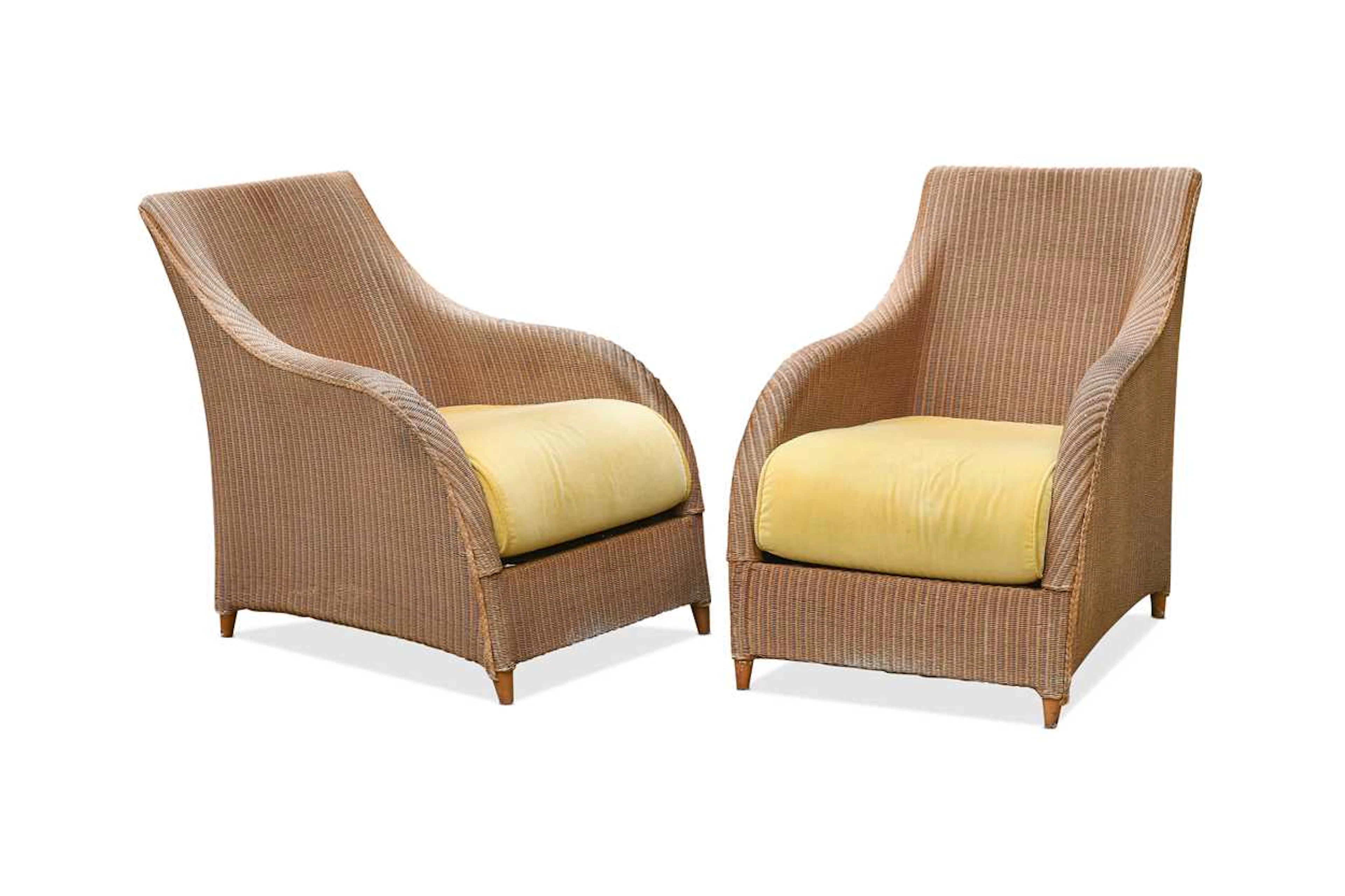 A pair of Terence Conran Lloyd Loom 'Nola' armchairs