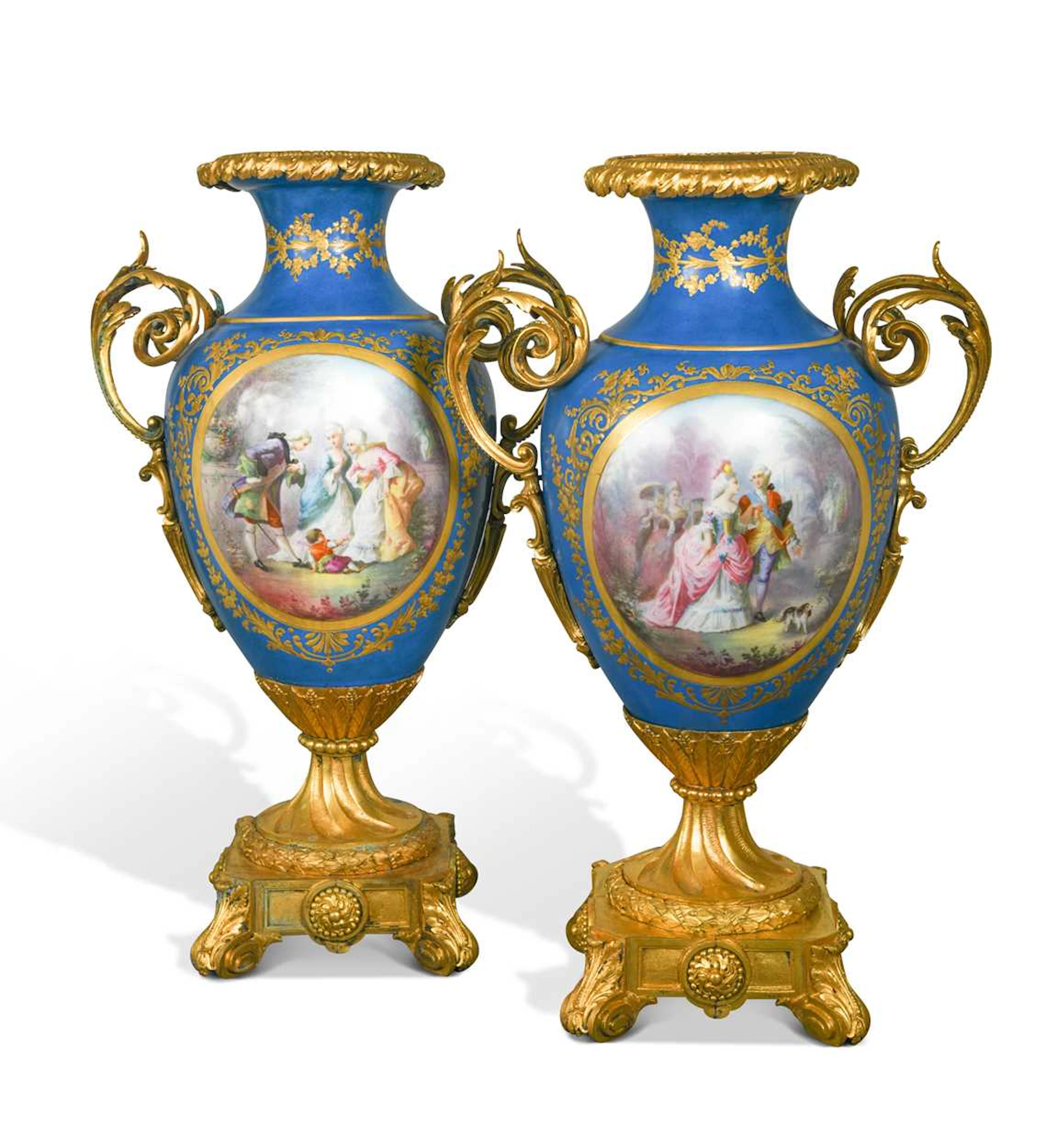 A pair of French porcelain, two-handled ormolu mounted vases, probably Sevres