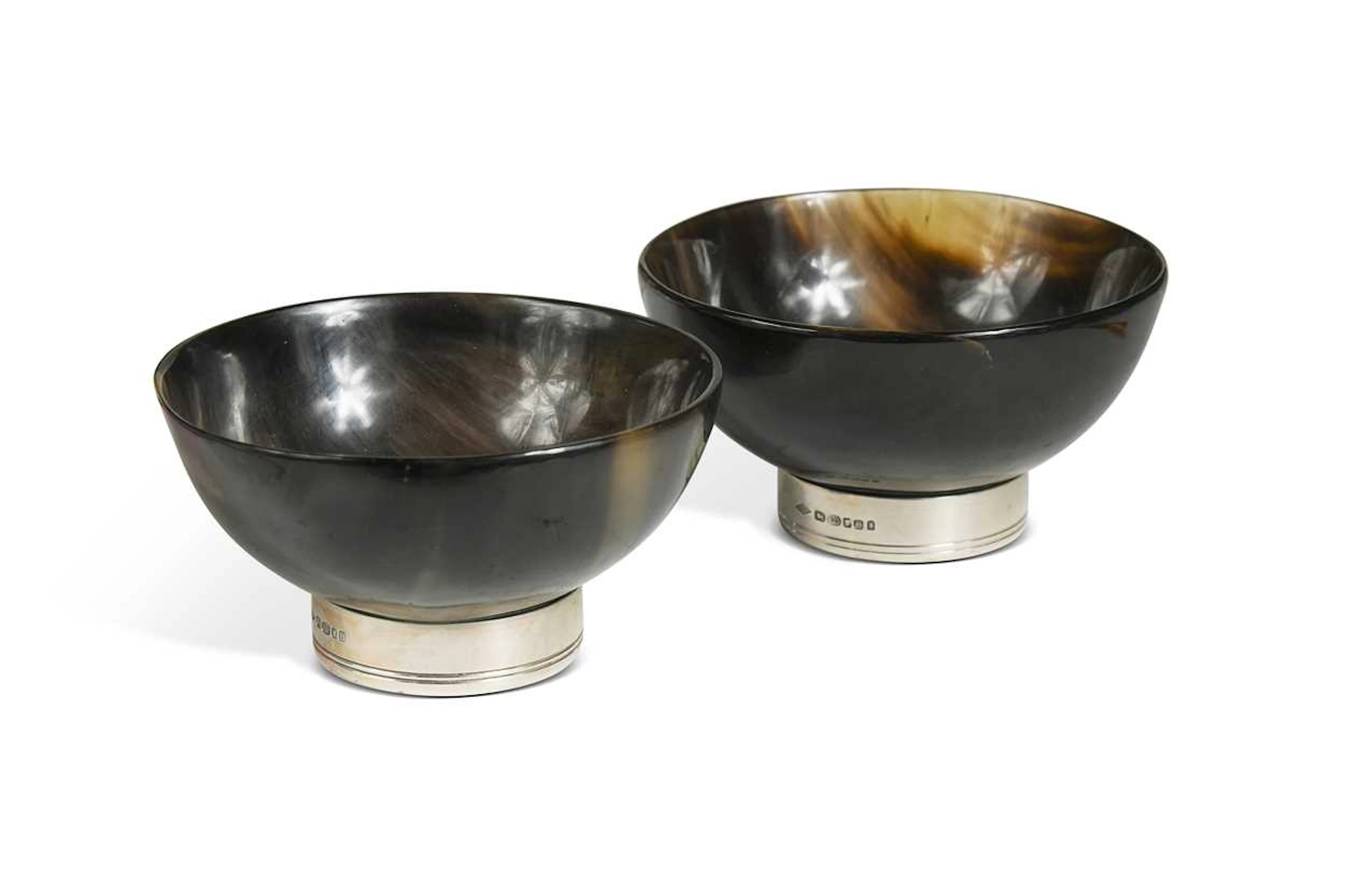 Braybrook & Britten, London, a pair of horn and silver-mounted bowls