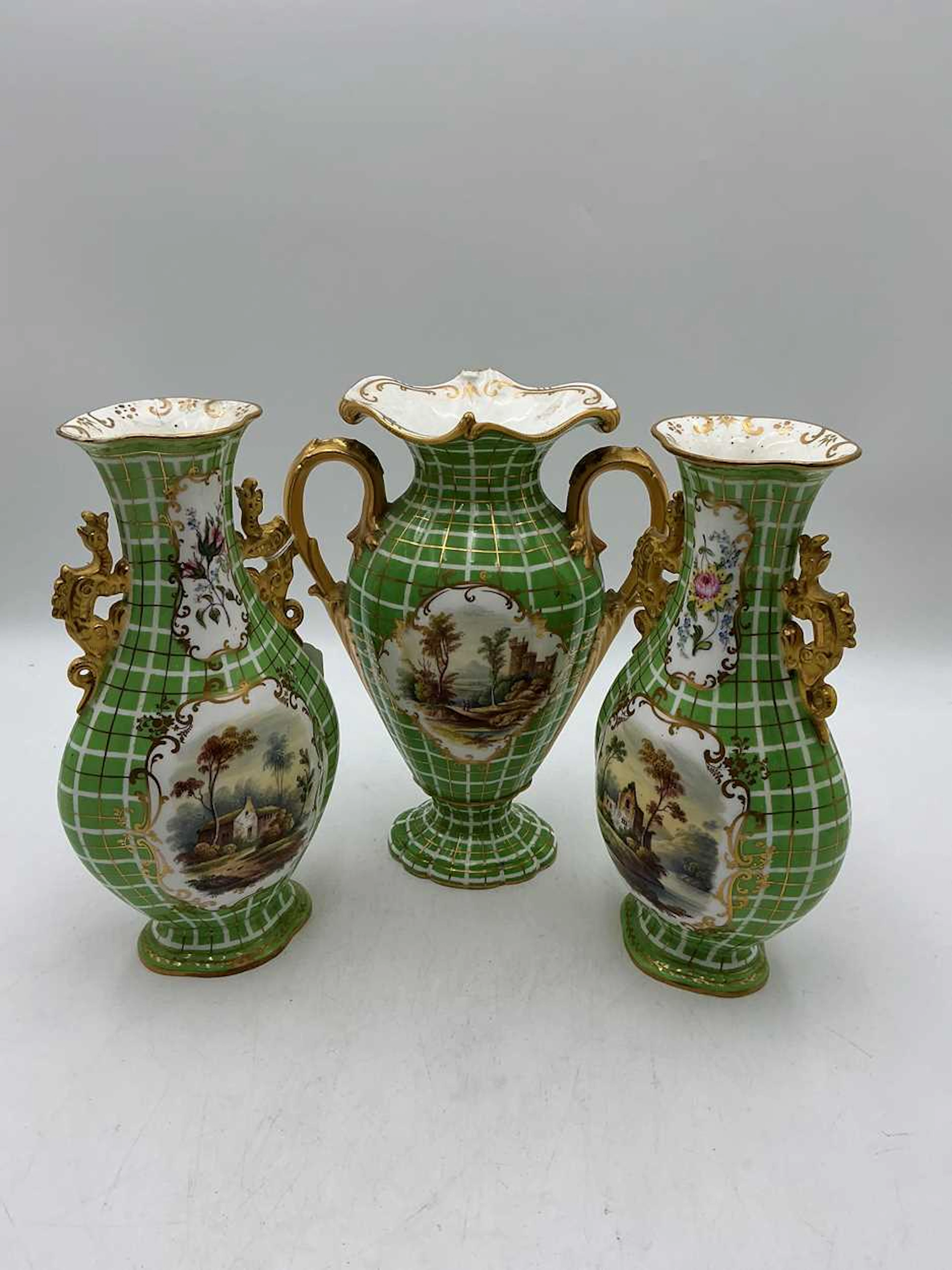 A pair of Minton two-handled vases