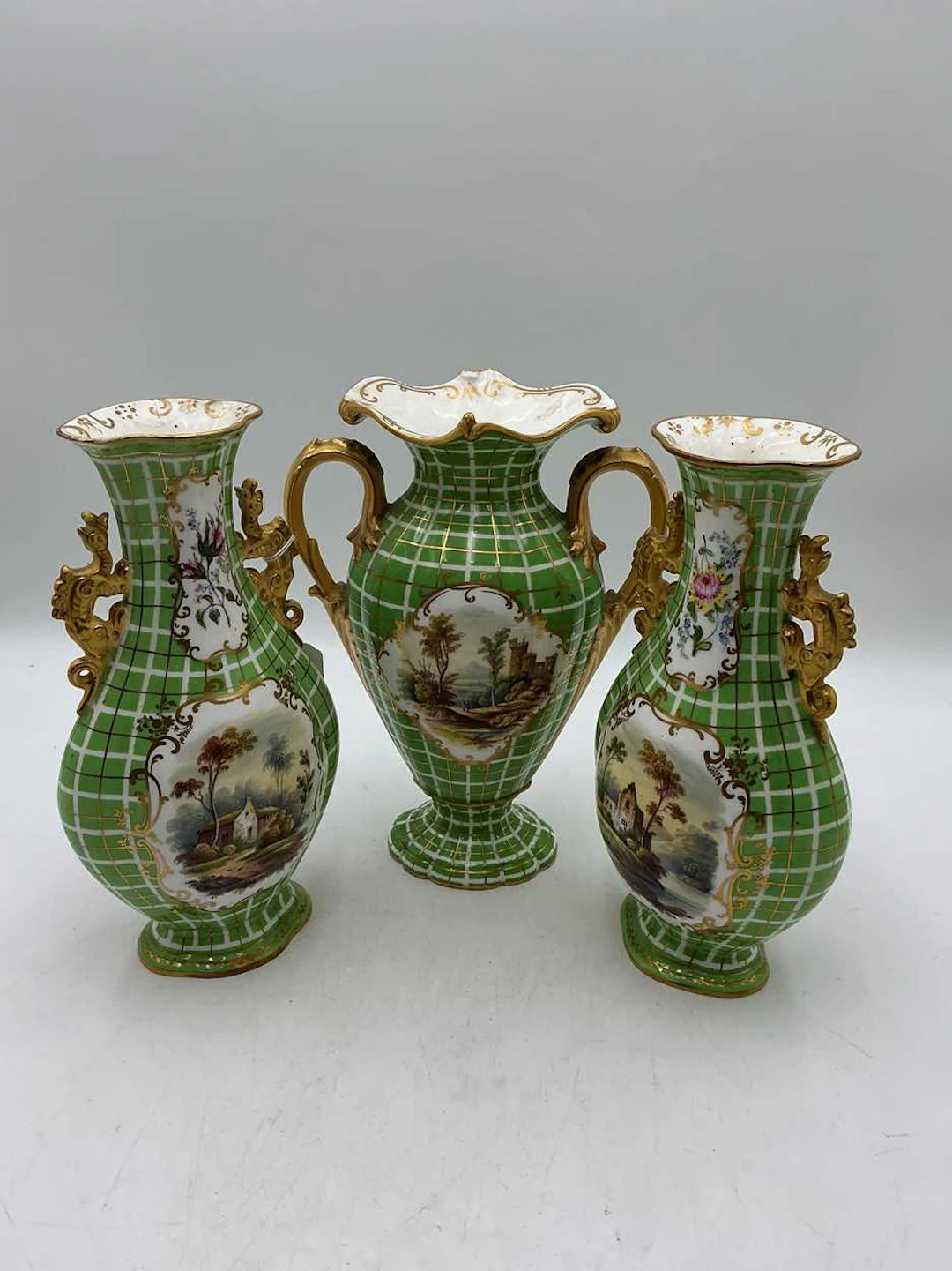A pair of Minton two-handled vases