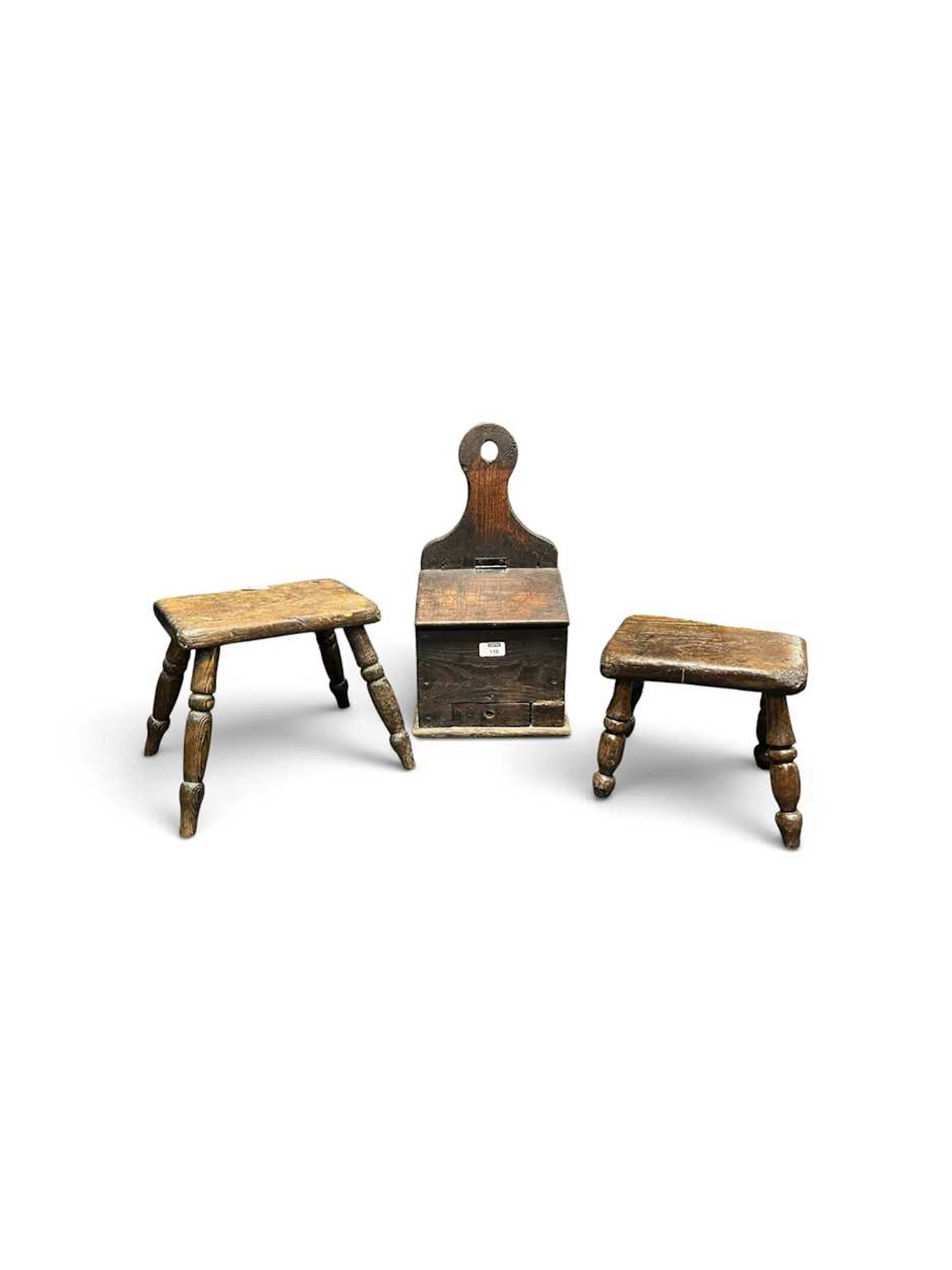 A wall mounted oak candle box